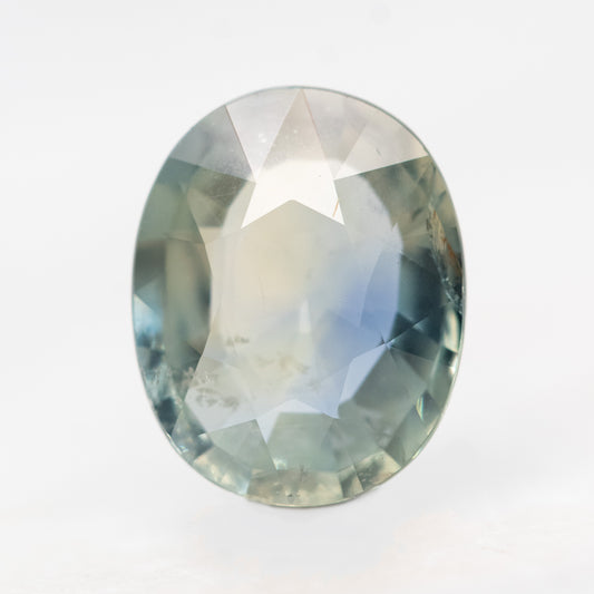 5.73 Carat Clear Teal Oval Sapphire for Custom Work - Inventory Code CTOS573 - Midwinter Co. Alternative Bridal Rings and Modern Fine Jewelry