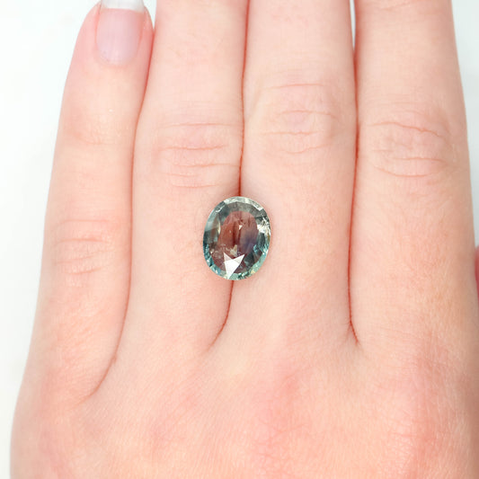 5.73 Carat Clear Teal Oval Sapphire for Custom Work - Inventory Code CTOS573 - Midwinter Co. Alternative Bridal Rings and Modern Fine Jewelry
