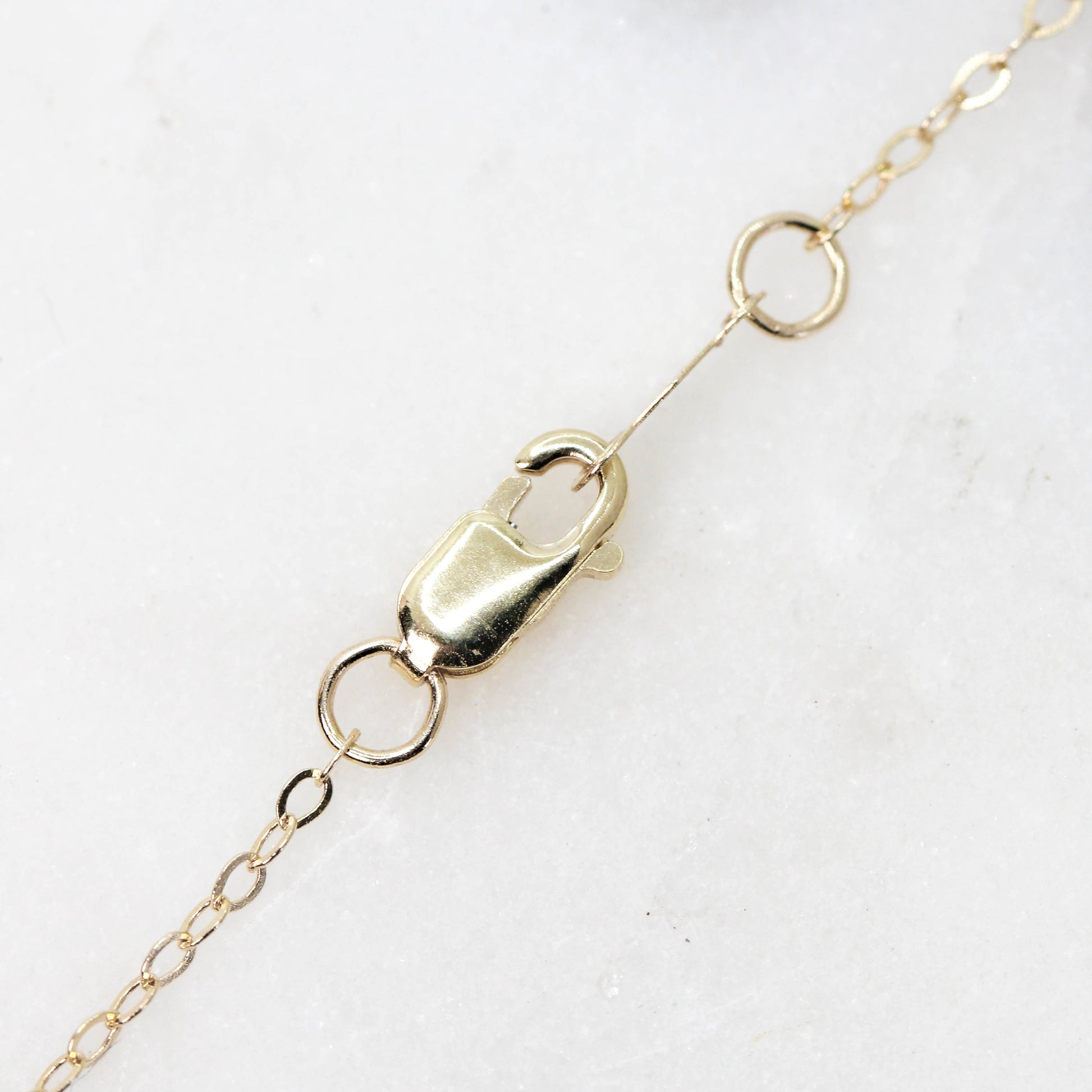 Christina Necklace with a 0.73 Carat Dark Gray Pear Diamond and White Accent Diamonds in 14k Yellow Gold - Ready to Ship - Midwinter Co. Alternative Bridal Rings and Modern Fine Jewelry