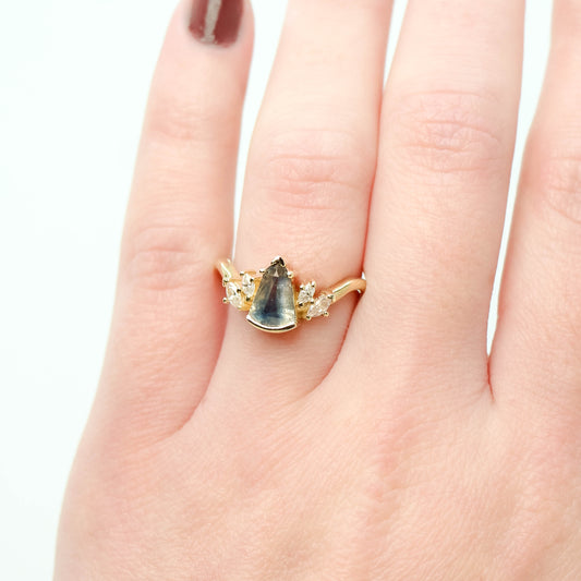 Freya Ring with a 1.21 Carat Misty Blue Shield Sapphire and White Accent Diamonds in 14k Yellow Gold - Ready to Size and Ship - Midwinter Co. Alternative Bridal Rings and Modern Fine Jewelry