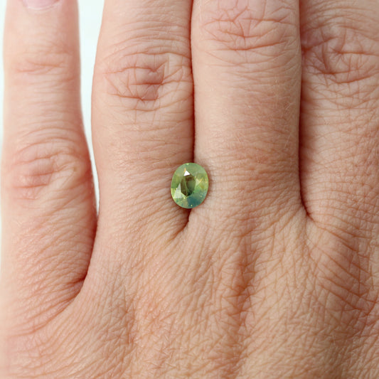 1.39 Carat Light Green Bicolor Oval Sapphire for Custom Work - Inventory Code GBOS139 - Midwinter Co. Alternative Bridal Rings and Modern Fine Jewelry
