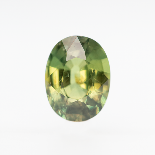 2.86 Carat Warm Green Oval Sapphire for Custom Work - Inventory Code GOS286