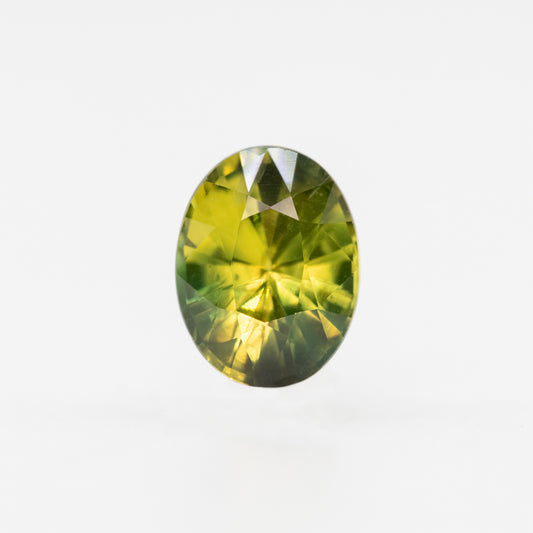 1.02 Carat Yellow-Green Oval Sapphire for Custom Work - Inventory Code GYOS102