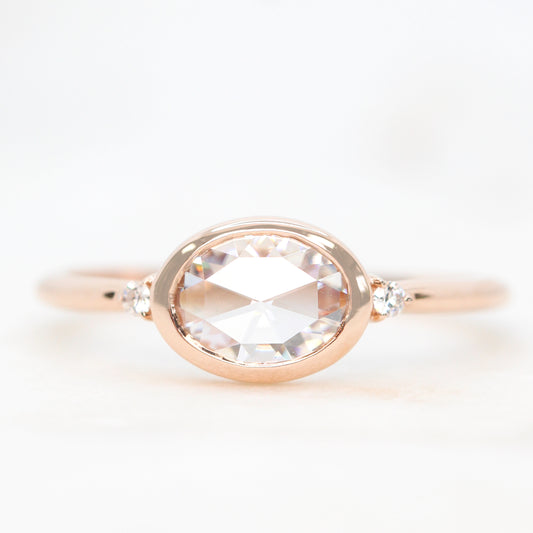 Beatrice Ring with a 0.66 Carat Clear Oval Moissanite and Round Accent Moissanites - Made to Order, Your Choice of Gold - Midwinter Co. Alternative Bridal Rings and Modern Fine Jewelry