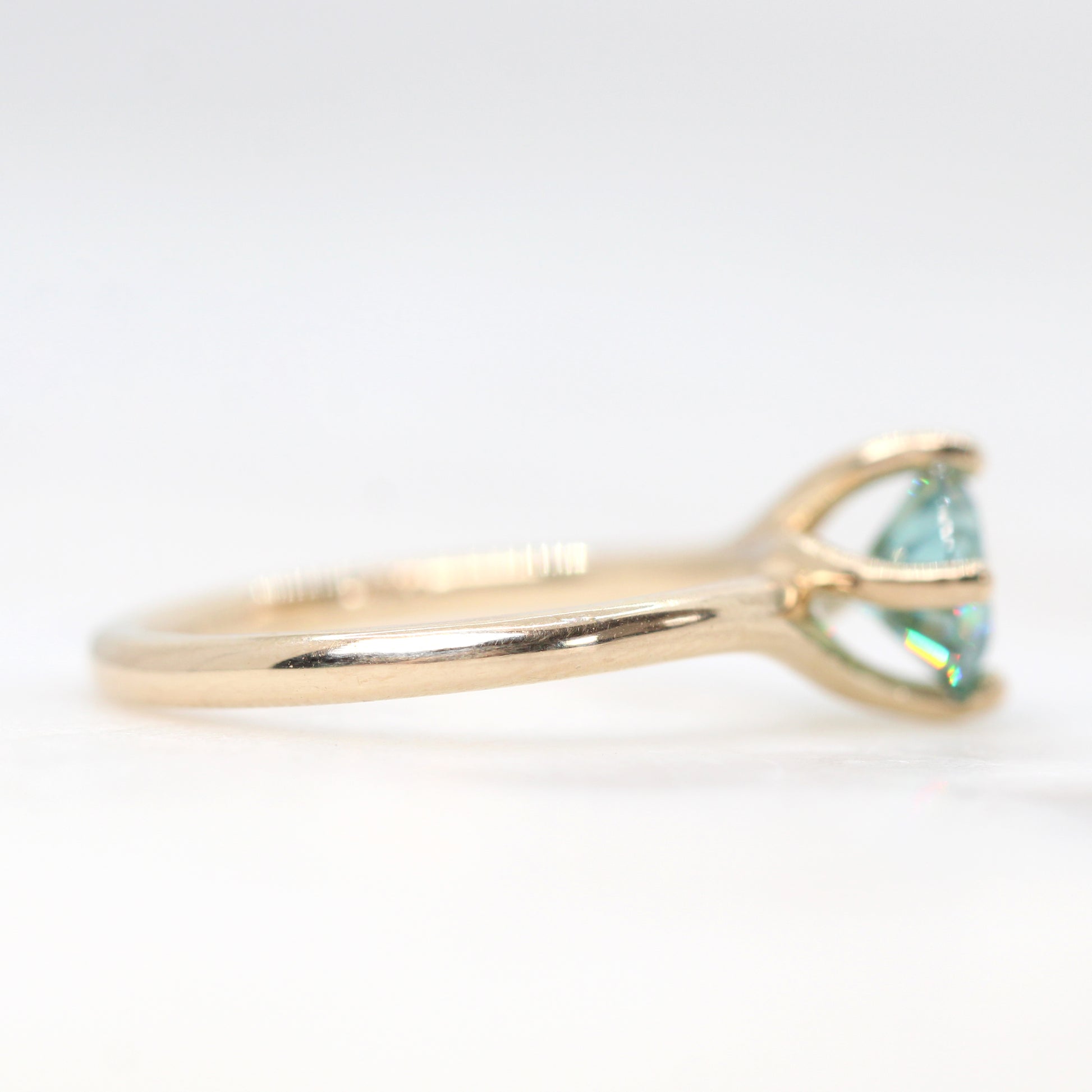 Spira Ring with a 1.00 Carat Round Teal Moissanite in 14k Champagne Gold - Ready to Size and Ship - Midwinter Co. Alternative Bridal Rings and Modern Fine Jewelry