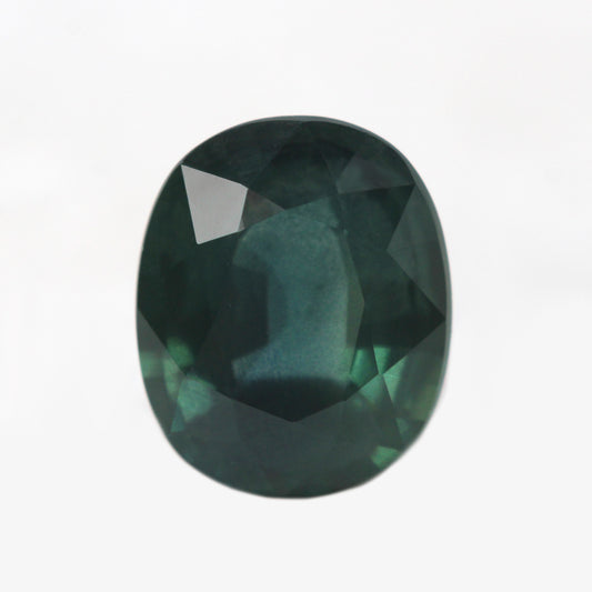 1.52 Carat Dark Teal Oval Sapphire for Custom Work - Inventory Code TOS152 - Midwinter Co. Alternative Bridal Rings and Modern Fine Jewelry