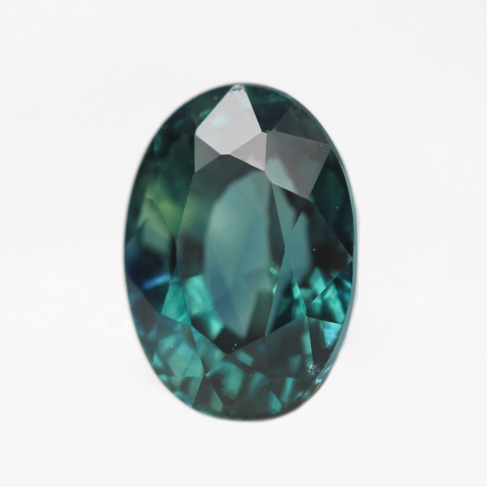 1.47 Carat Oval Teal Madagascar Sapphire for Custom Work - Inventory Code TOS147 - Midwinter Co. Alternative Bridal Rings and Modern Fine Jewelry