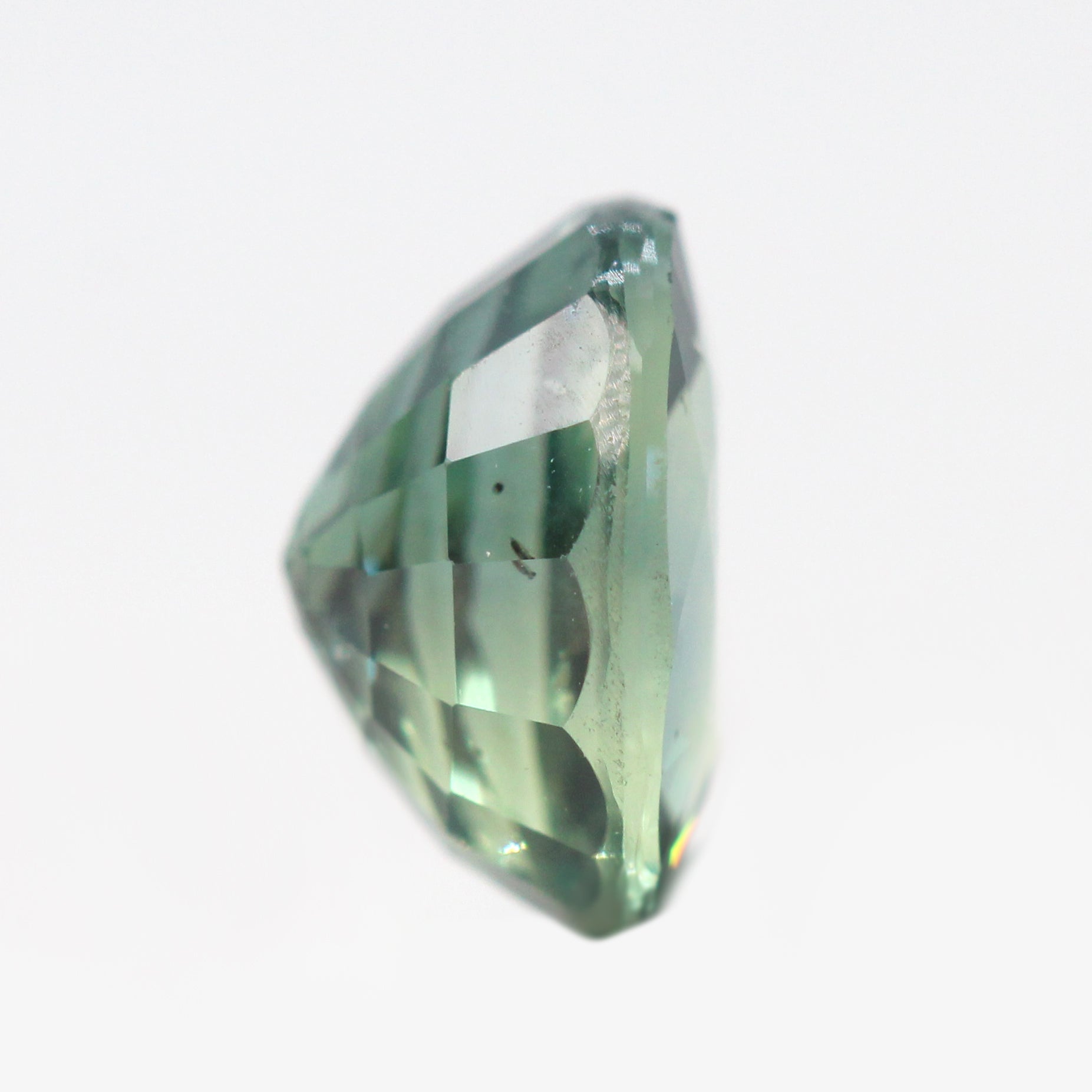 1.55 Carat Light Teal Green Oval Madagascar Sapphire for Custom Work - Inventory Code TGOS155 - Midwinter Co. Alternative Bridal Rings and Modern Fine Jewelry