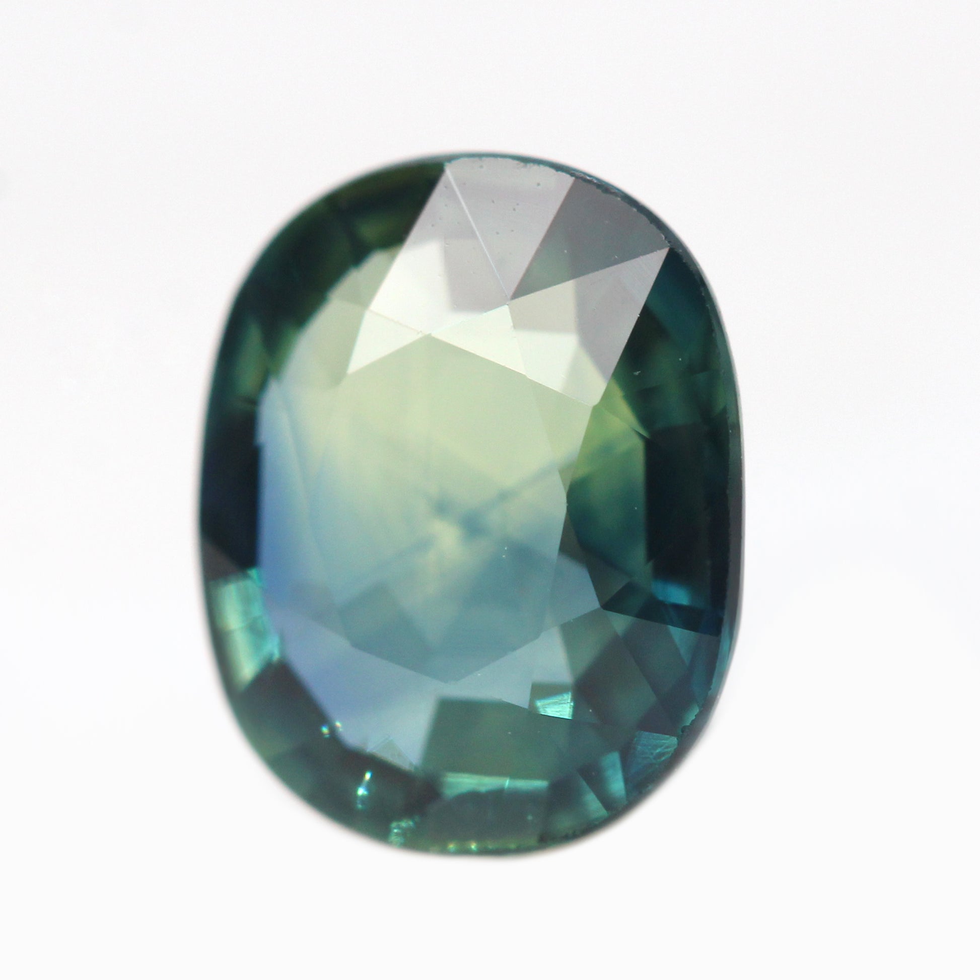 1.64 Carat Rounded Oval Clear Teal Australian Sapphire for Custom Work - Inventory Code TOS164 - Midwinter Co. Alternative Bridal Rings and Modern Fine Jewelry