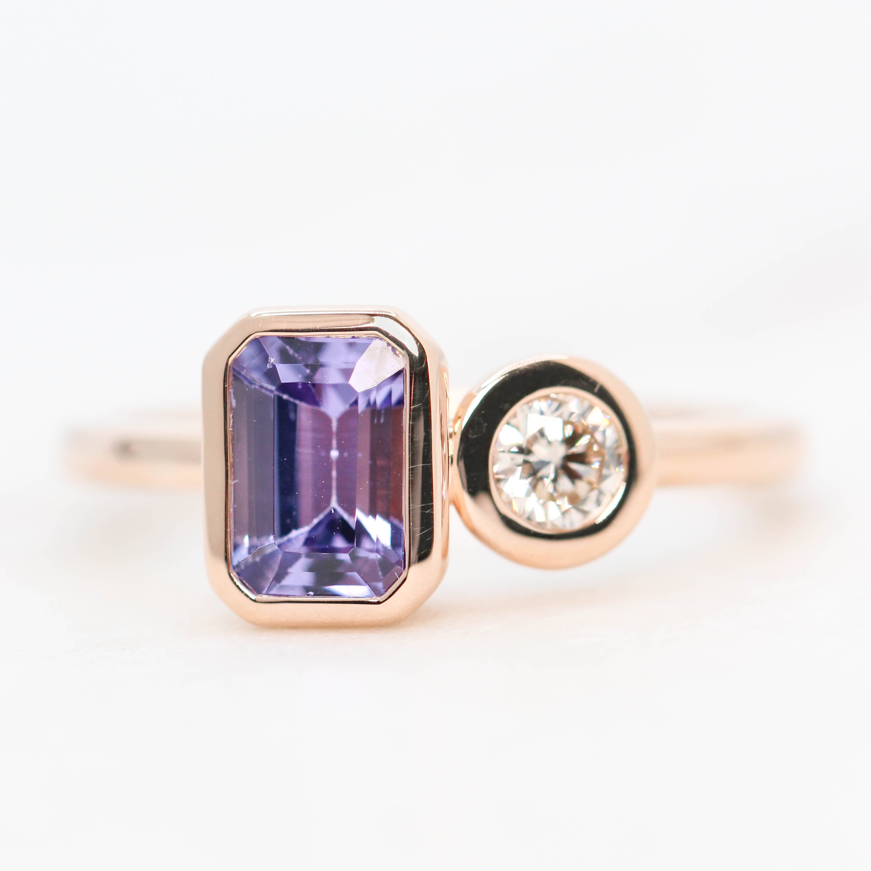 Toi et Moi Ring with an Emerald Cut Tanzanite White Round