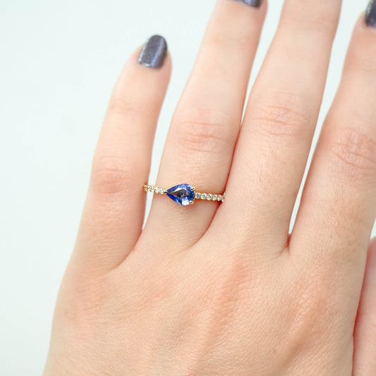 Gayle Ring with a 0.68 Carat Cornflower Blue Pear Sapphire and White Accent Diamonds in 10k Yellow Gold - Ready to Size and Ship - Midwinter Co. Alternative Bridal Rings and Modern Fine Jewelry