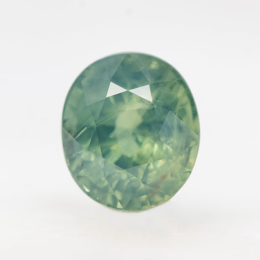 2.13 Carat Light Teal Oval Sapphire for Custom Work - Inventory Code LGOS213 - Midwinter Co. Alternative Bridal Rings and Modern Fine Jewelry