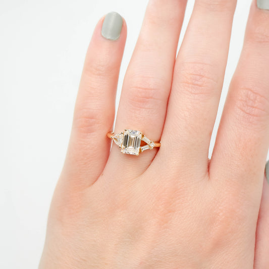 Meridith Ring with a 1.91 Carat Emerald Cut Lab Grown Diamond and Natural White Accent Diamonds in 14k Yellow Gold - Ready to Size and Ship - Midwinter Co. Alternative Bridal Rings and Modern Fine Jewelry