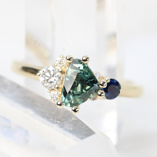 Project: Custom Serena Ring with a 1 Carat Teal Blue Trillion Sapphire and Asymmetrical Accent Diamonds in 14k - Midwinter Co. Alternative Bridal Rings and Modern Fine Jewelry