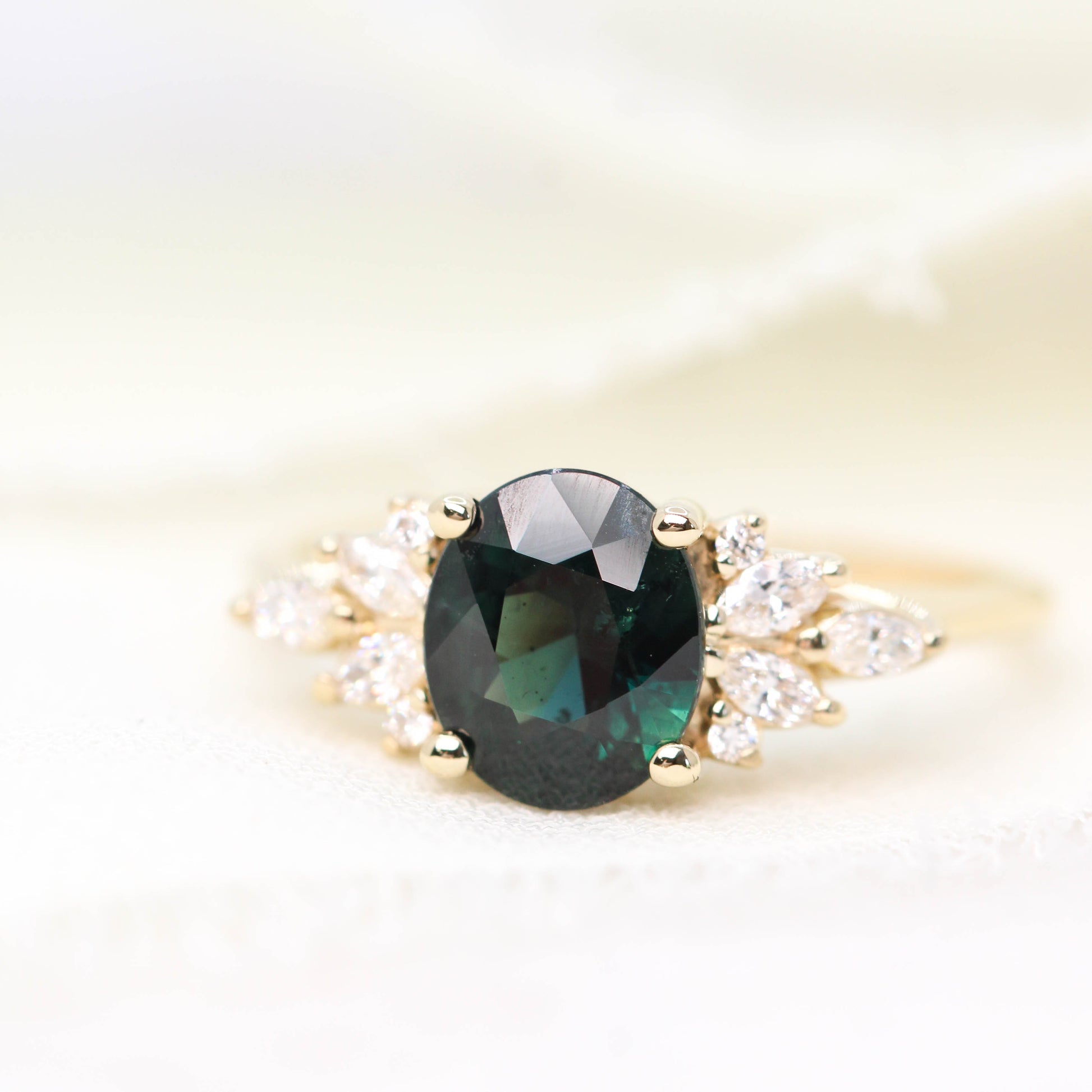 Odette Ring with a 1.29 Carat Teal Oval Sapphire and White Accent Diamonds in 14k Yellow Gold - Ready to Size and Ship - Midwinter Co. Alternative Bridal Rings and Modern Fine Jewelry