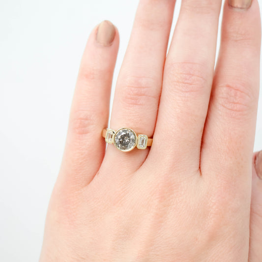 Ruta Ring with a 1.32 Carat Gray Salt and Pepper Natural Round Diamond and Lab Grown Emerald Cut Accent Diamonds in 14k Yellow Gold - Ready to Size and Ship - Midwinter Co. Alternative Bridal Rings and Modern Fine Jewelry