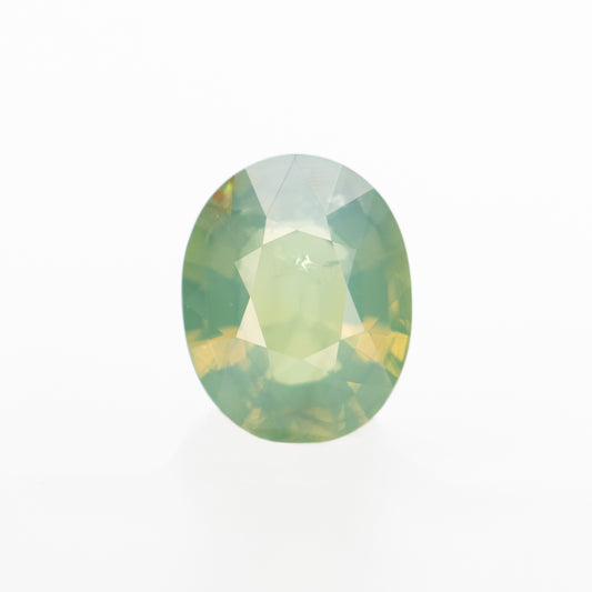 0.92 Carat Slightly Opalescent Yellow-Green Oval Sapphire for Custom Work - Inventory Code YGOS092 - Midwinter Co. Alternative Bridal Rings and Modern Fine Jewelry