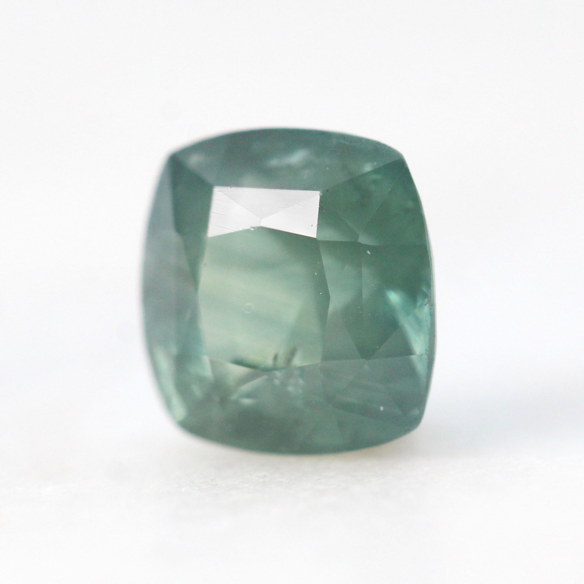 1.47 Carat Light Teal Cushion Sapphire for Custom Work - Inventory Code TCS147 - Midwinter Co. Alternative Bridal Rings and Modern Fine Jewelry