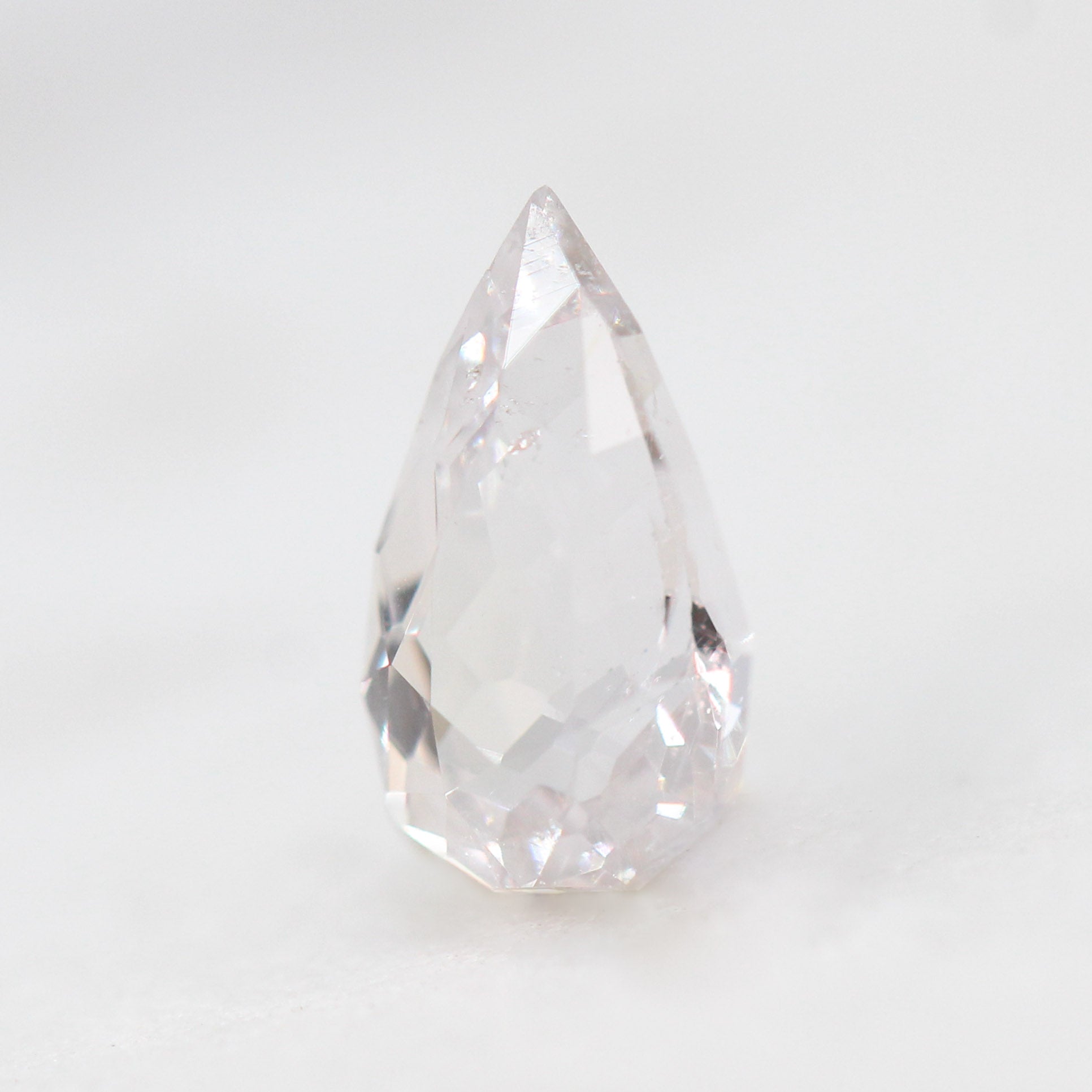 0.81 Carat Clear Pear Sapphire for Custom Work - Inventory Code CPS081 - Midwinter Co. Alternative Bridal Rings and Modern Fine Jewelry