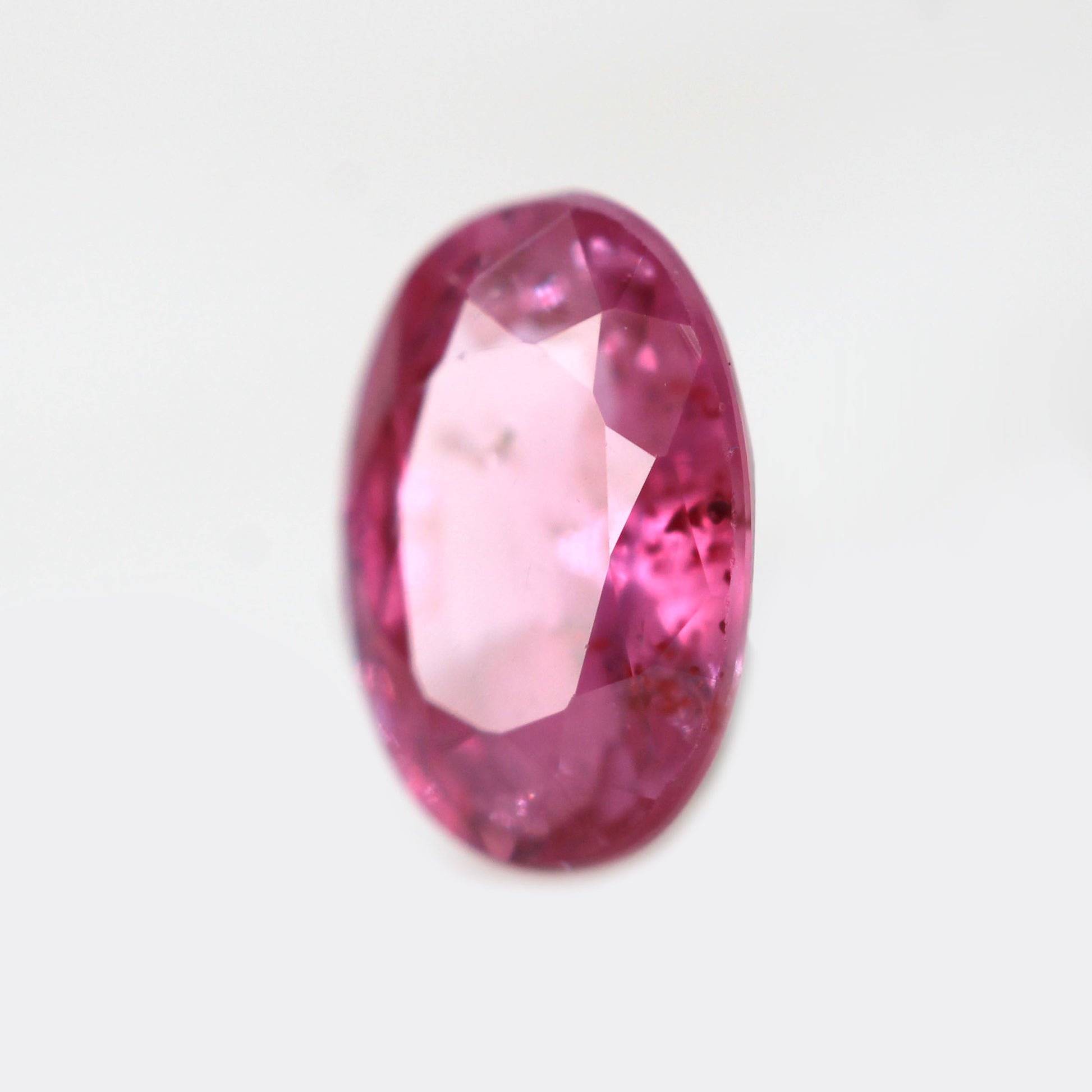 0.60 Carat Oval Red Pink Sapphire for Custom Work - Inventory Code ORPS060 - Midwinter Co. Alternative Bridal Rings and Modern Fine Jewelry