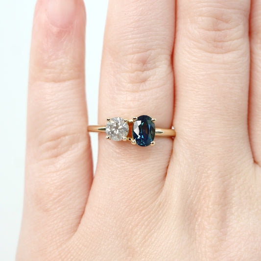 Toi et Moi Ring with a 0.58 Light Gray Round Celestial Diamond and a 1.11 Carat Teal Blue Oval Sapphire in 14k Yellow Gold - Ready to Size and Ship - Midwinter Co. Alternative Bridal Rings and Modern Fine Jewelry