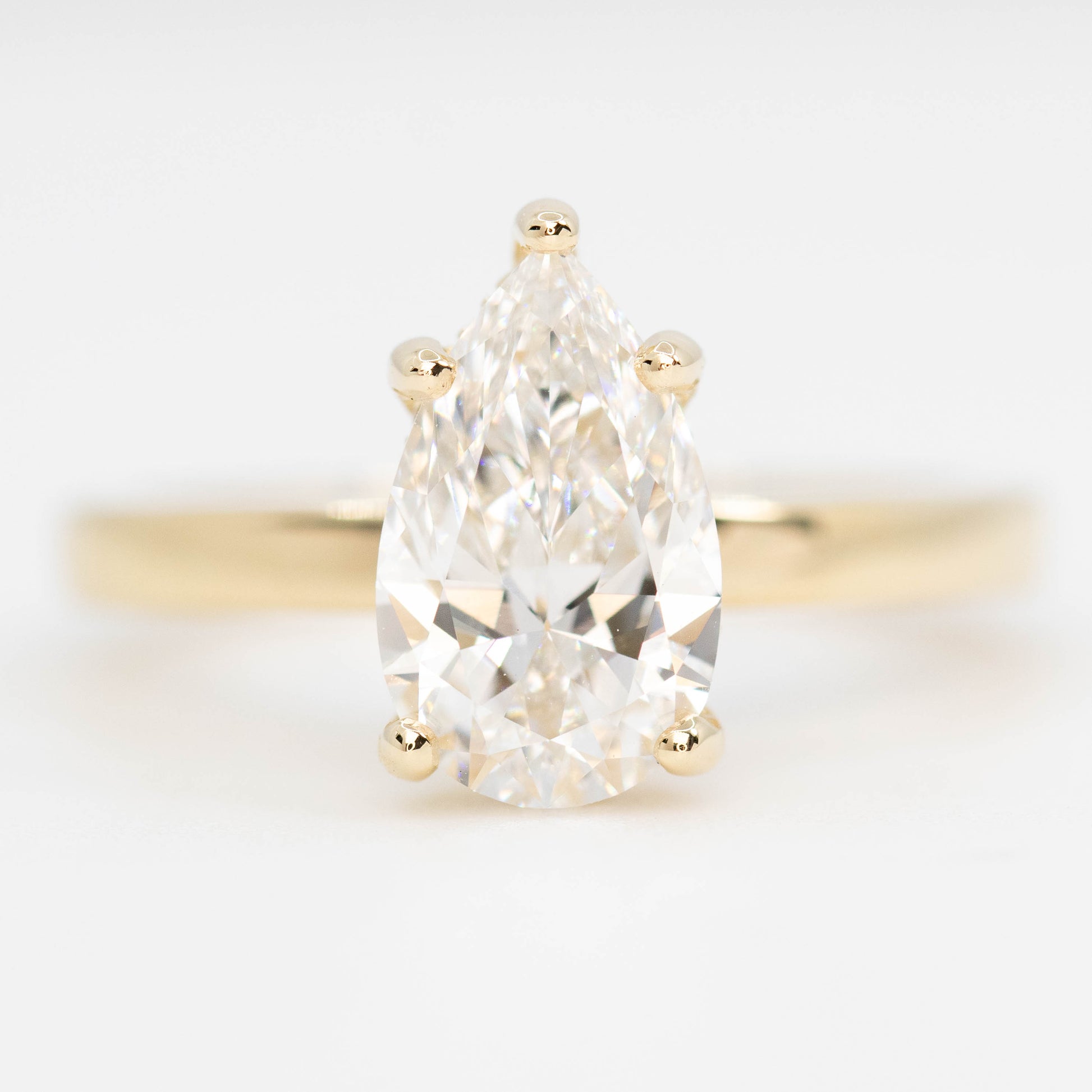 Adele Ring with a 1.98 Carat Lab Grown Pear Diamond and Hidden Diamond Halo in 14k Yellow Gold - Ready to Size and Ship - Midwinter Co. Alternative Bridal Rings and Modern Fine Jewelry