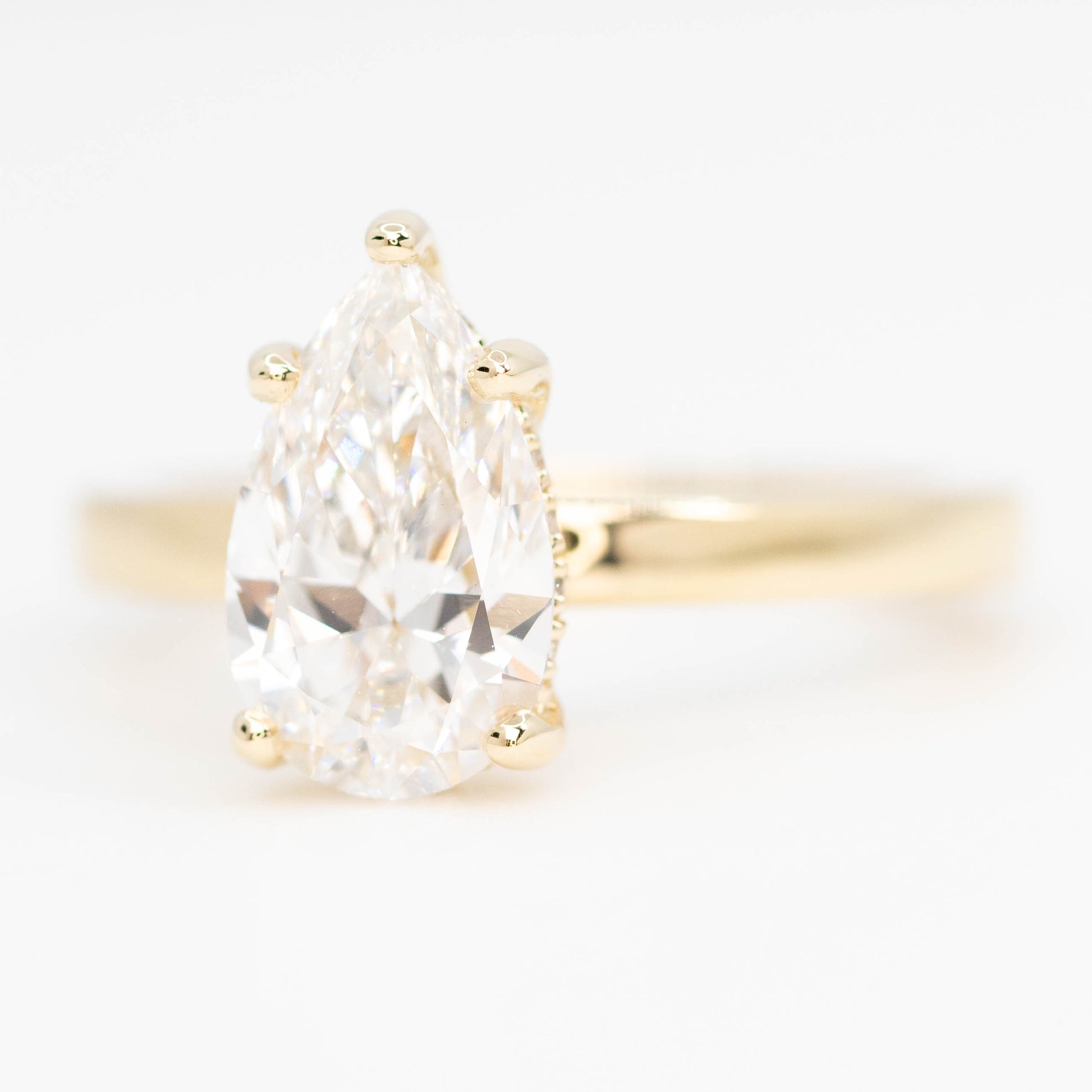 Adele Ring with a 1.98 Carat Lab Grown Pear Diamond and Hidden Diamond Halo in 14k Yellow Gold - Ready to Size and Ship - Midwinter Co. Alternative Bridal Rings and Modern Fine Jewelry