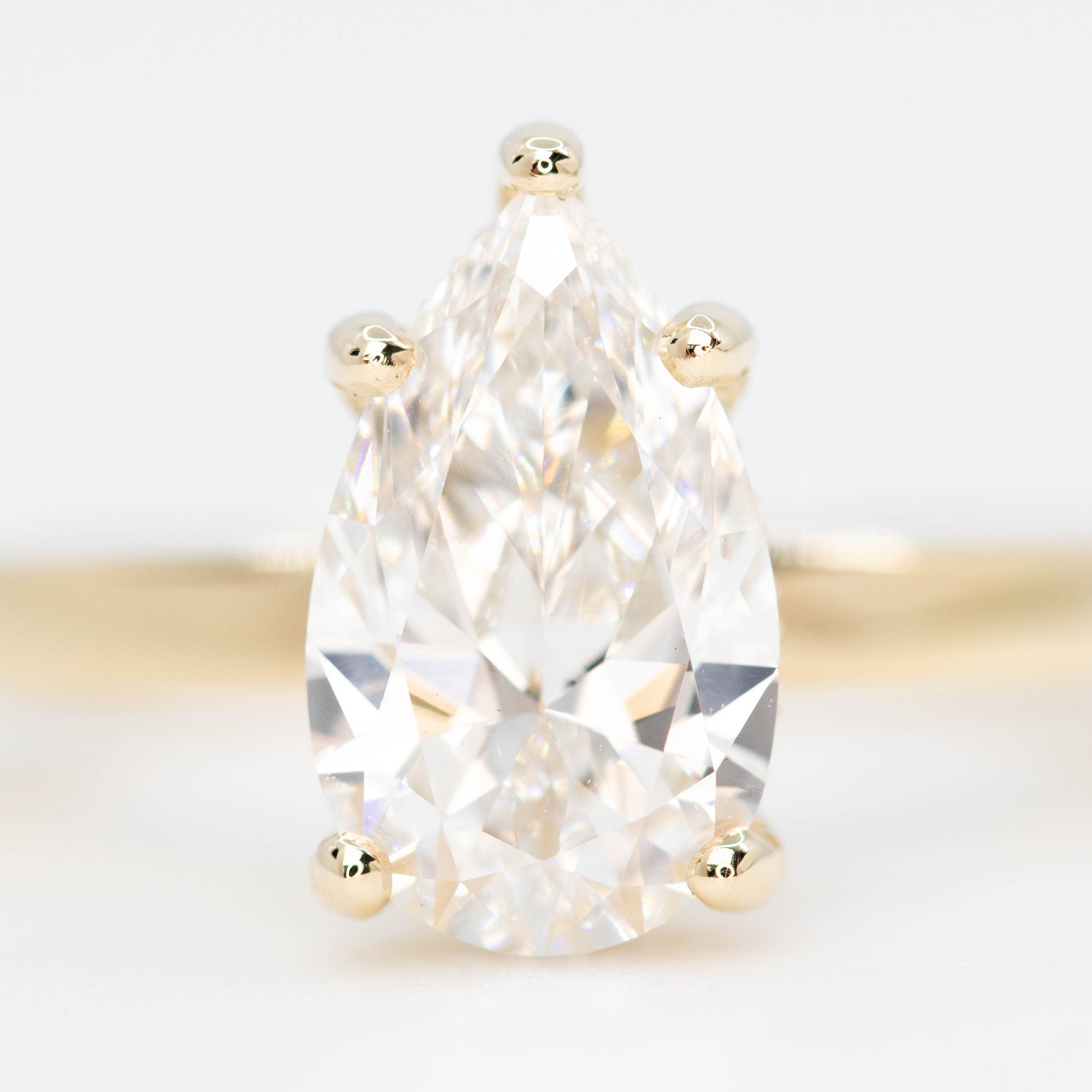 Adele Ring with a 1.98 Carat Lab Grown Pear Diamond and Hidden Diamond Halo in 14k Yellow Gold - Ready to Size and Ship - Midwinter Co. Alternative Bridal Rings and Modern Fine Jewelry