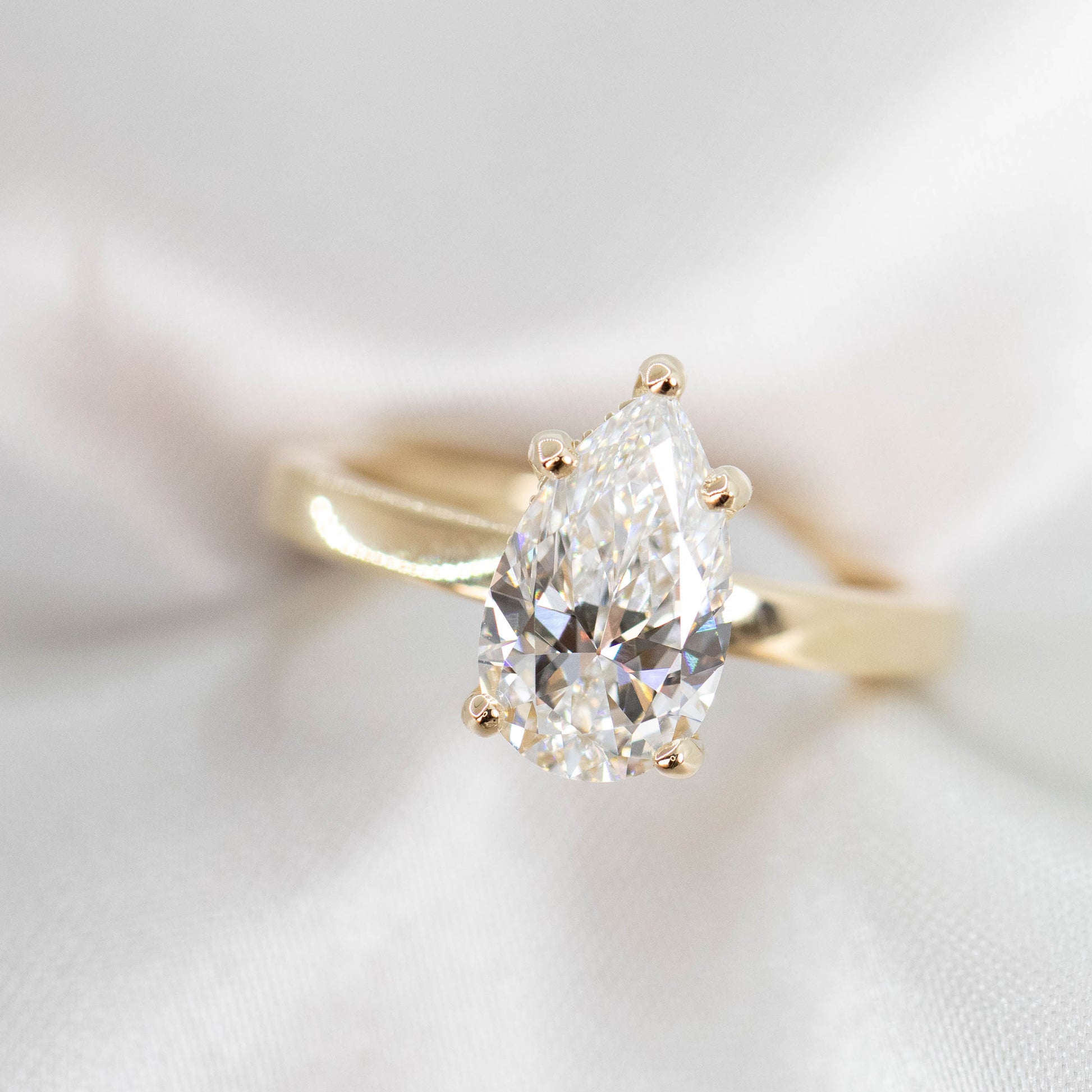 Adele Ring with a 1.98 Carat Lab Grown Pear Diamond and Hidden Diamond Halo in 14k Yellow Gold - Ready to Size and Ship - Midwinter Co. Alternative Bridal Rings and Modern Fine Jewelry