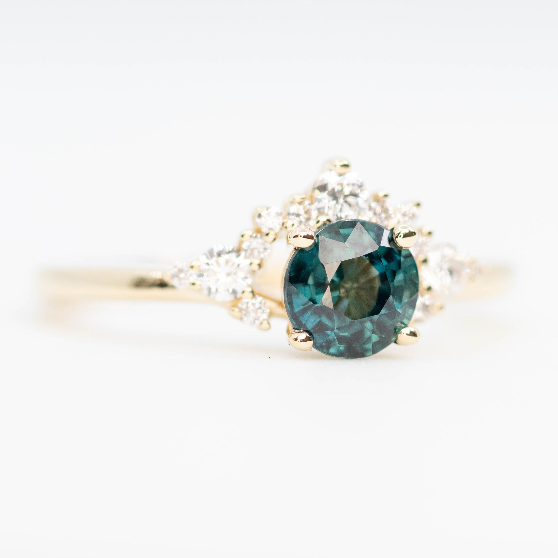 Athena Ring with a 0.85 Carat Teal Round Sapphire and White Accent Diamonds in 14k Yellow Gold - Ready to Size and Ship - Midwinter Co. Alternative Bridal Rings and Modern Fine Jewelry