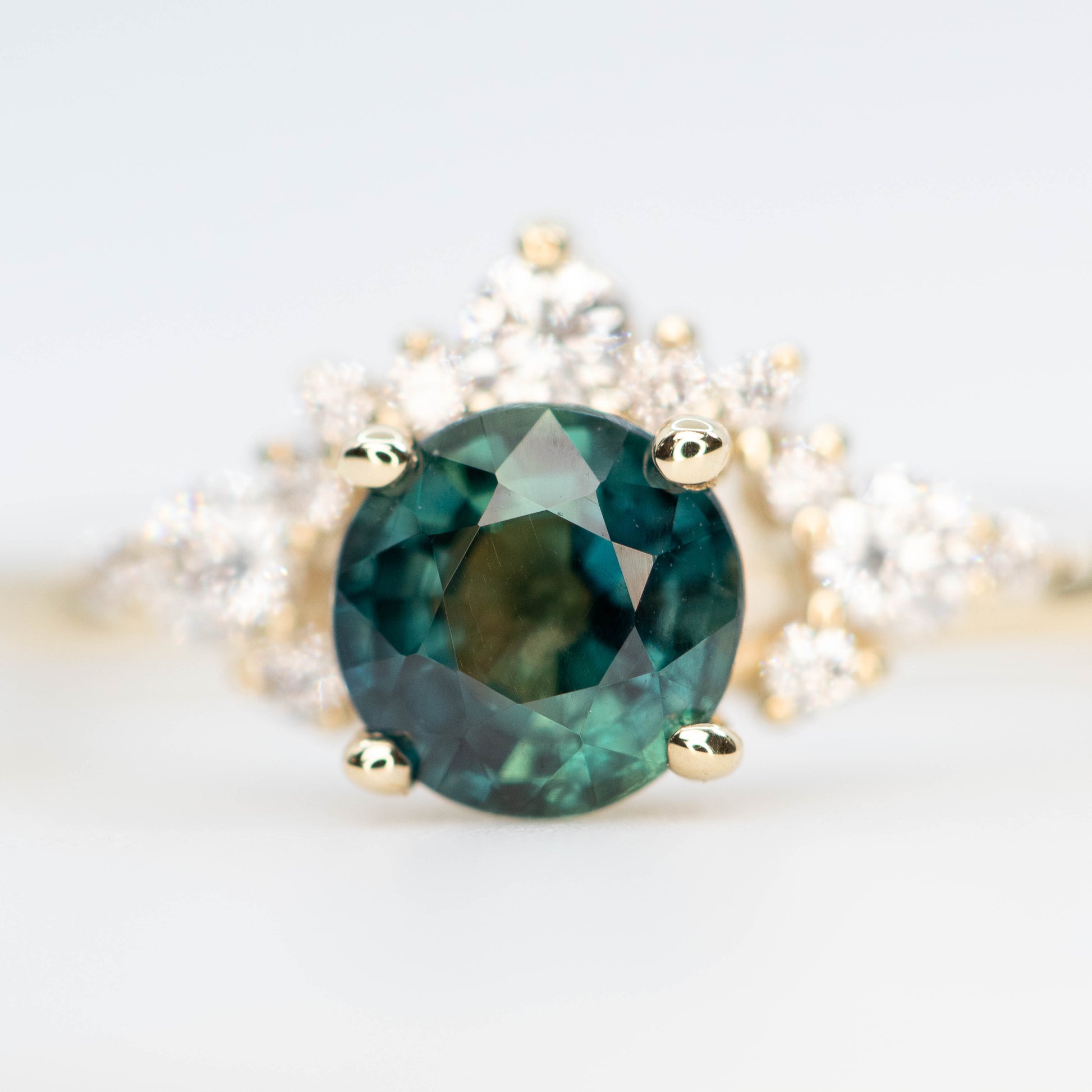 Athena Ring with a 0.85 Carat Teal Round Sapphire and White Accent Diamonds in 14k Yellow Gold - Ready to Size and Ship - Midwinter Co. Alternative Bridal Rings and Modern Fine Jewelry