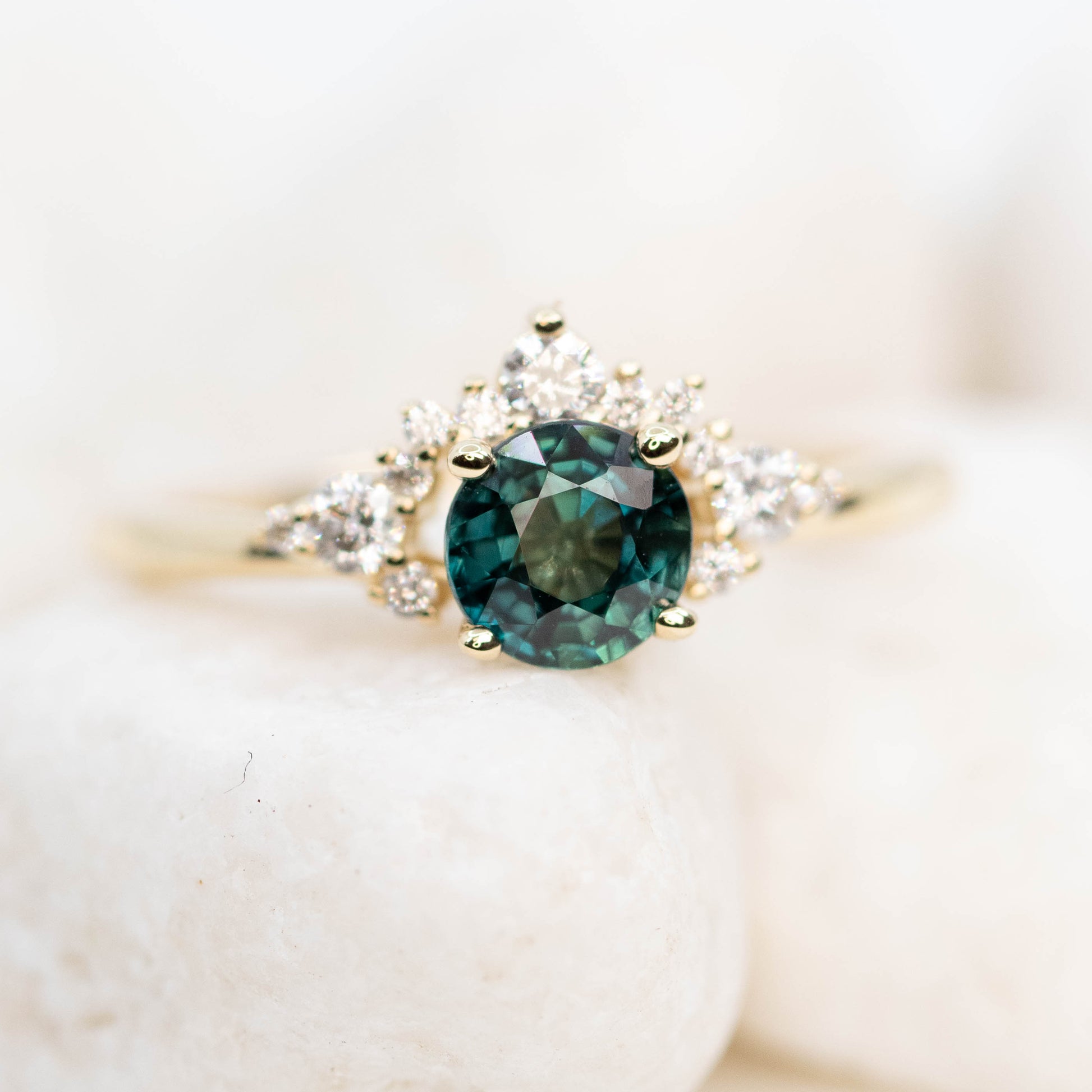 Athena Ring with a 0.85 Carat Teal Round Sapphire and White Accent Diamonds in 14k Yellow Gold - Ready to Size and Ship - Midwinter Co. Alternative Bridal Rings and Modern Fine Jewelry