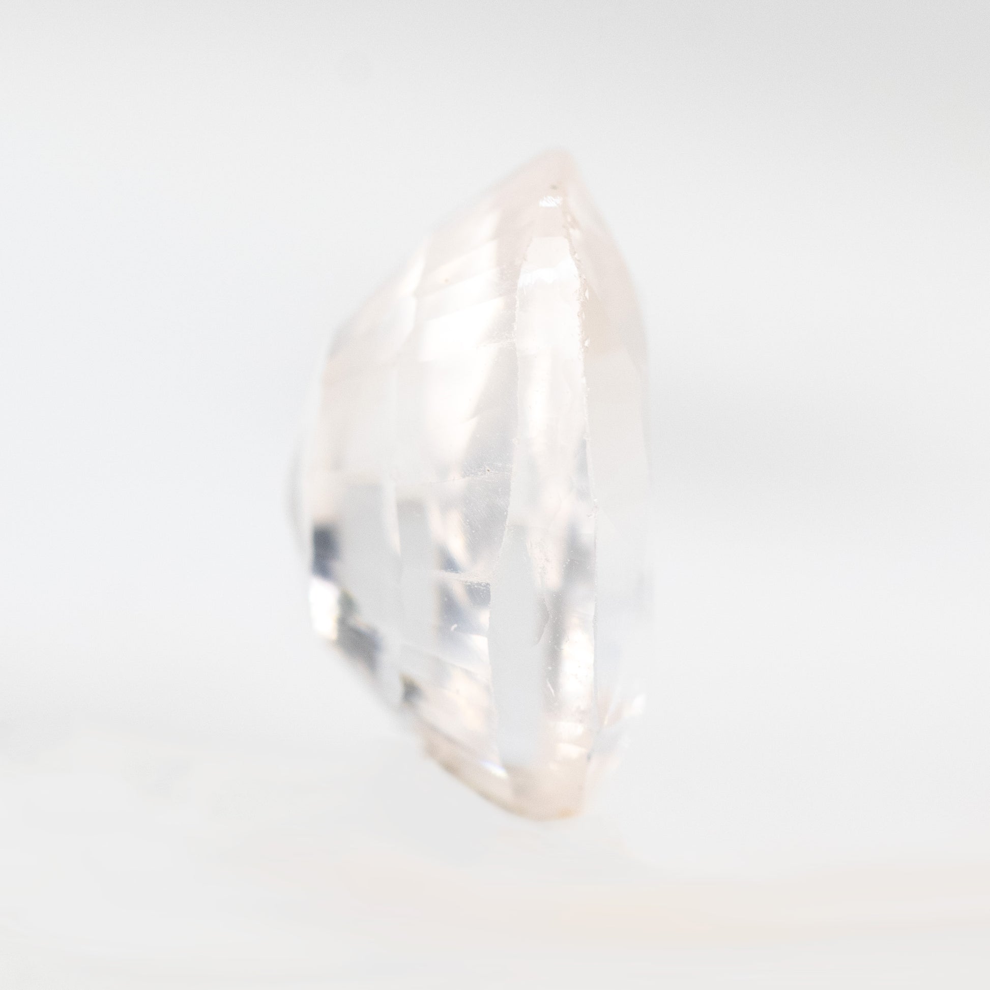 CAELEN (J)  7.28 Carat Clear Oval Lab Grown Sapphire for Custom Work - Inventory Code COS728 - Midwinter Co. Alternative Bridal Rings and Modern Fine Jewelry