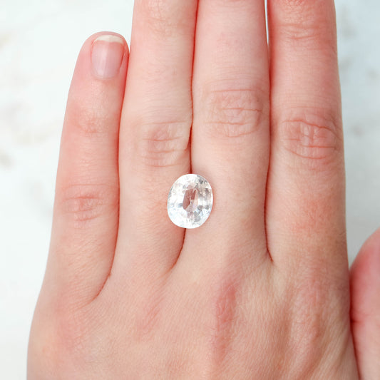 CAELEN (J)  7.28 Carat Clear Oval Lab Grown Sapphire for Custom Work - Inventory Code COS728 - Midwinter Co. Alternative Bridal Rings and Modern Fine Jewelry