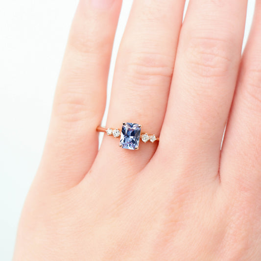 Cordelia Ring with a 0.88 Carat Blue Emerald Cut Sapphire and Diamond Accents in 14k Rose Gold - Ready to Size and Ship