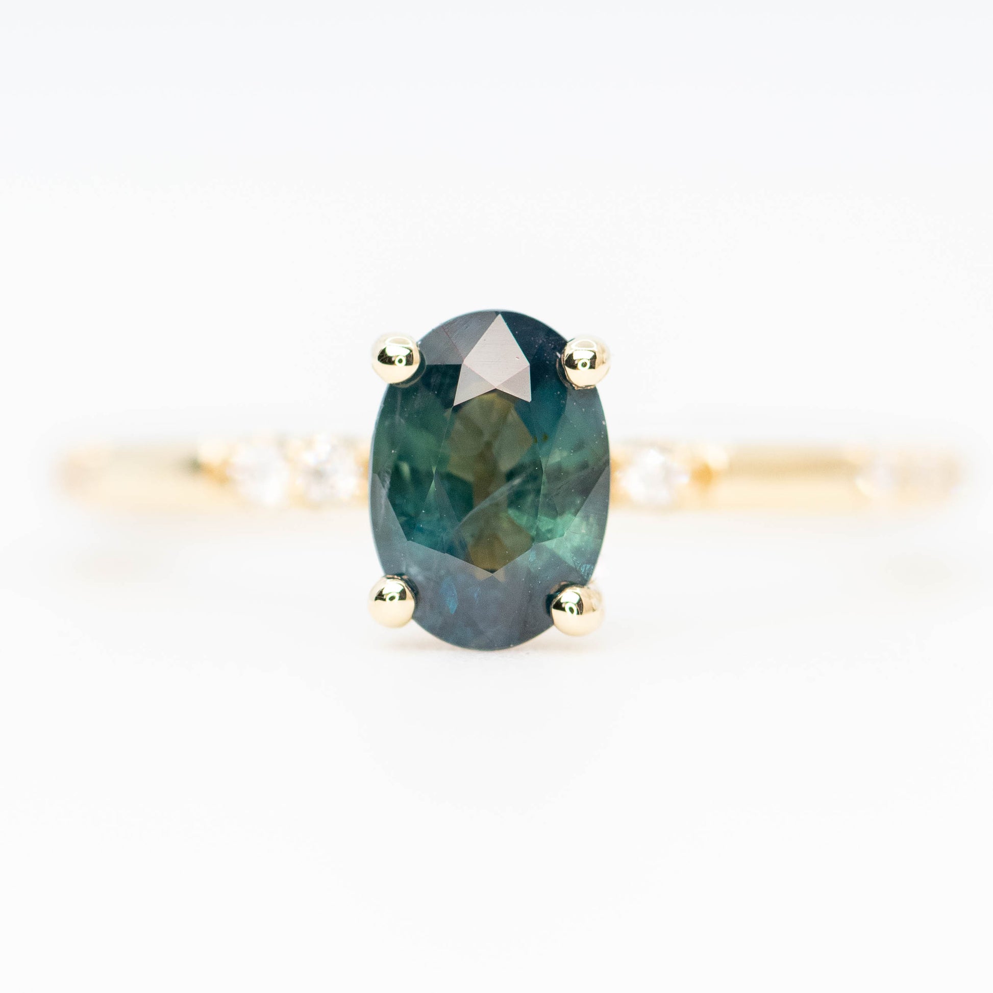 Estelle Ring with a 1.03 Carat Teal Oval Sapphire and White Accent Diamonds in 14k Yellow Gold - Ready to Size and Ship - Midwinter Co. Alternative Bridal Rings and Modern Fine Jewelry