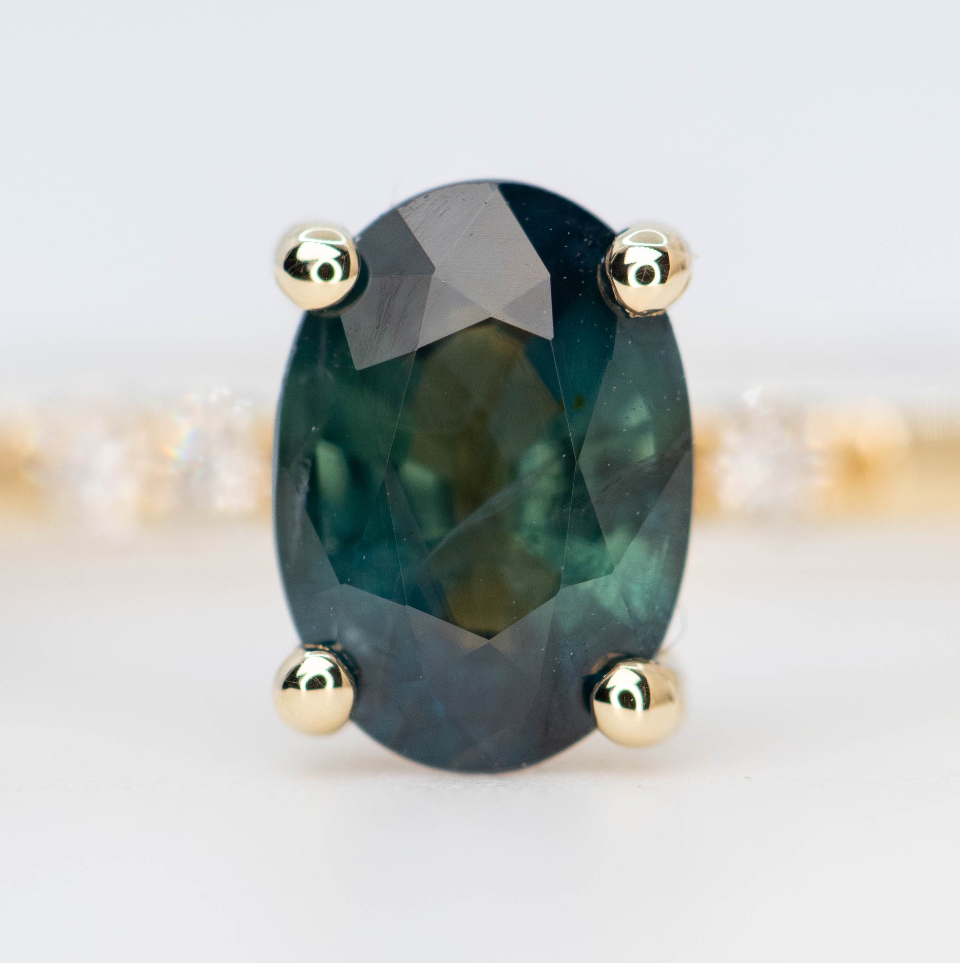 Estelle Ring with a 1.03 Carat Teal Oval Sapphire and White Accent Diamonds in 14k Yellow Gold - Ready to Size and Ship - Midwinter Co. Alternative Bridal Rings and Modern Fine Jewelry