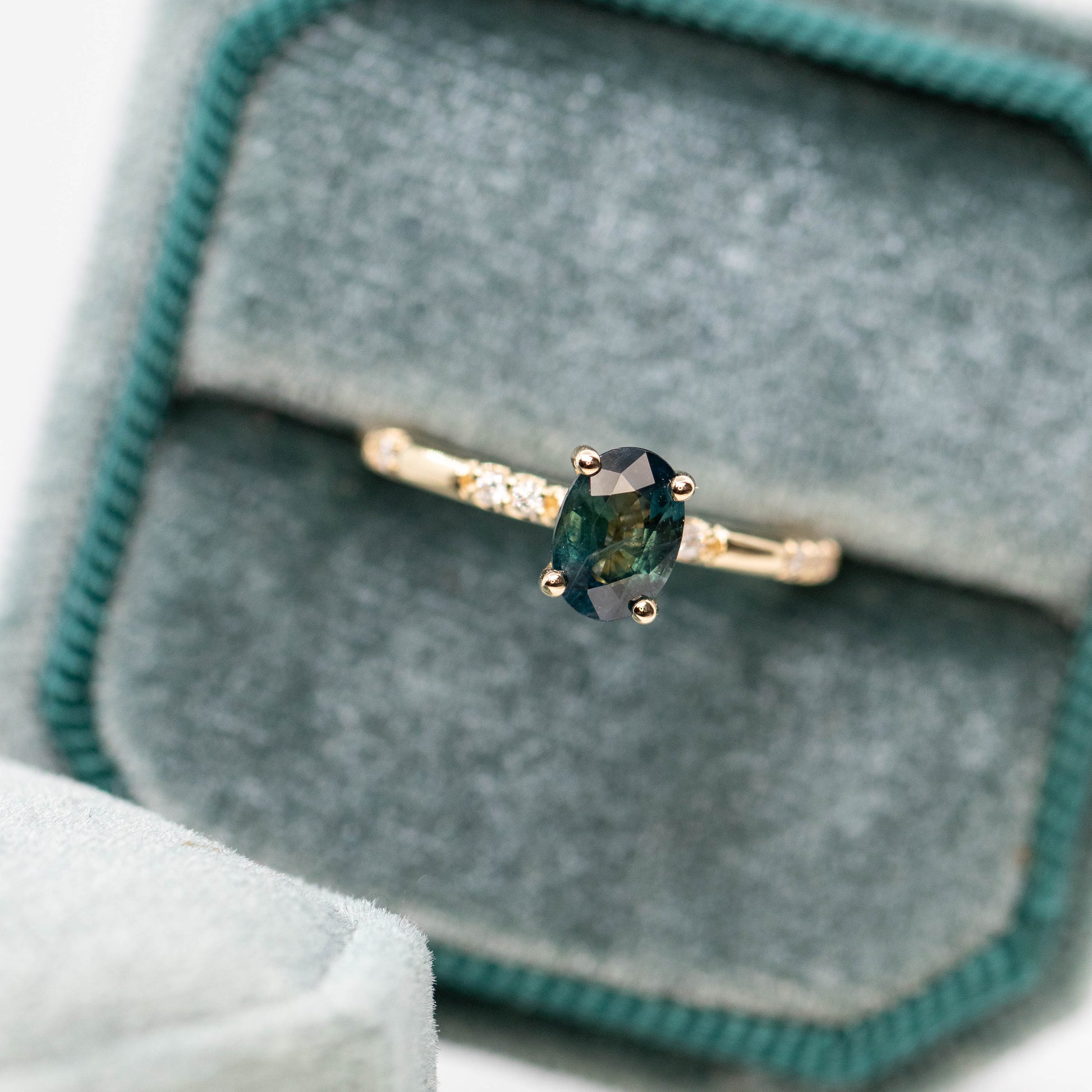 Estelle Ring with a 1.03 Carat Teal Oval Sapphire and White Accent Diamonds in 14k Yellow Gold - Ready to Size and Ship - Midwinter Co. Alternative Bridal Rings and Modern Fine Jewelry