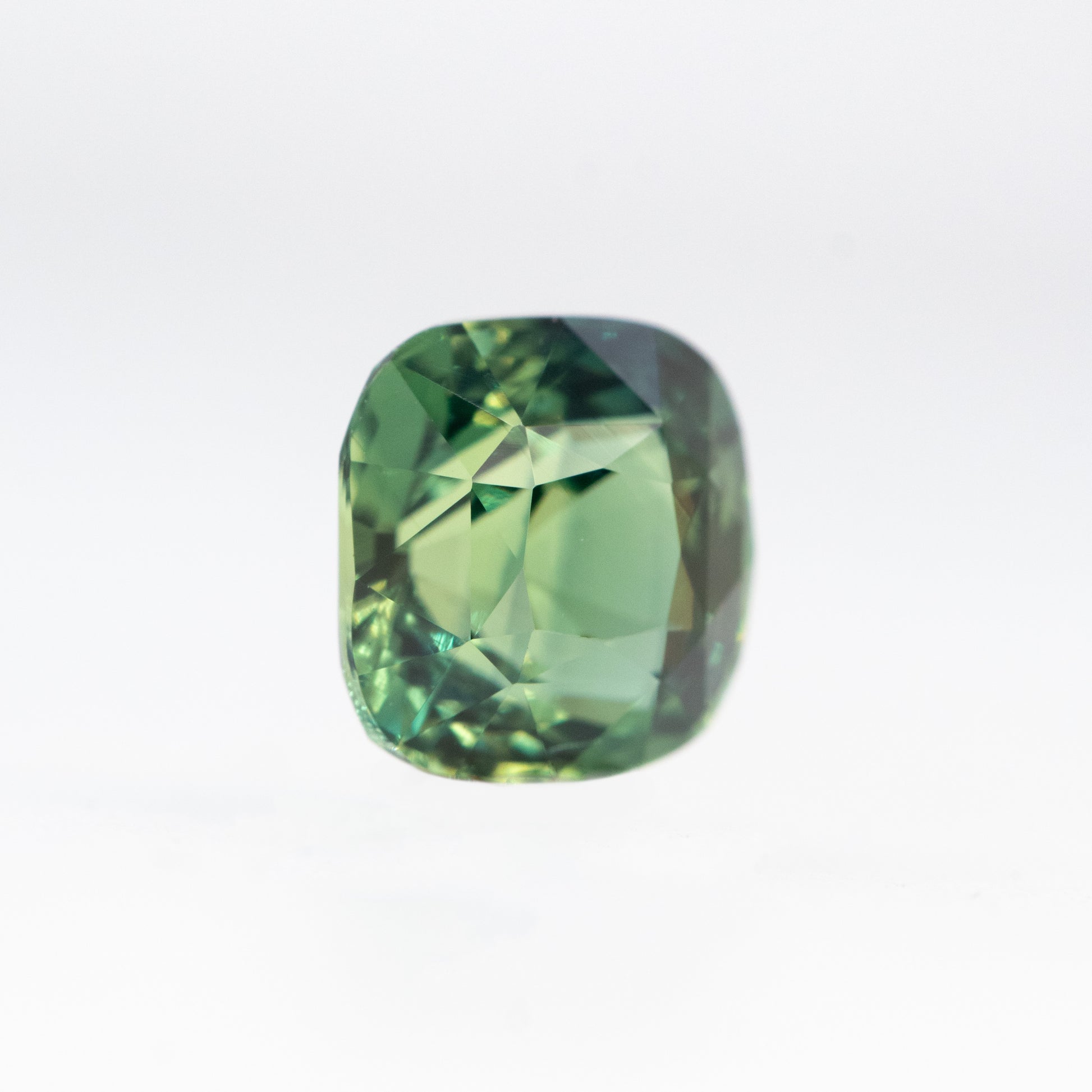 CAELEN (J) 2.04 Carat Green Cushion Cut Sapphire for Custom Work - Inventory Code GCS204 - Midwinter Co. Alternative Bridal Rings and Modern Fine Jewelry