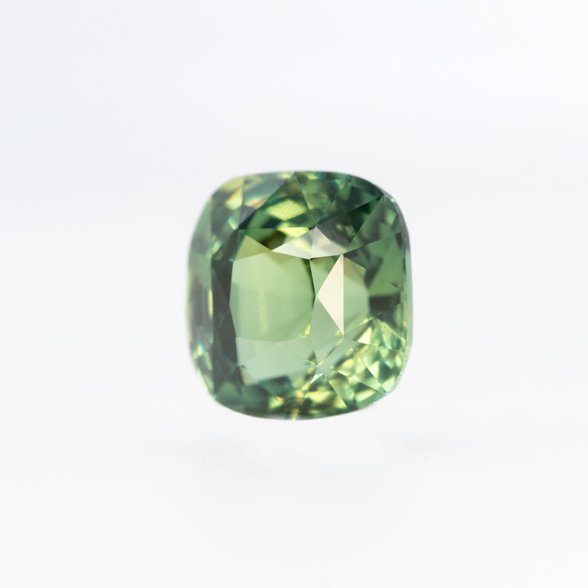 CAELEN (J) 2.04 Carat Green Cushion Cut Sapphire for Custom Work - Inventory Code GCS204 - Midwinter Co. Alternative Bridal Rings and Modern Fine Jewelry
