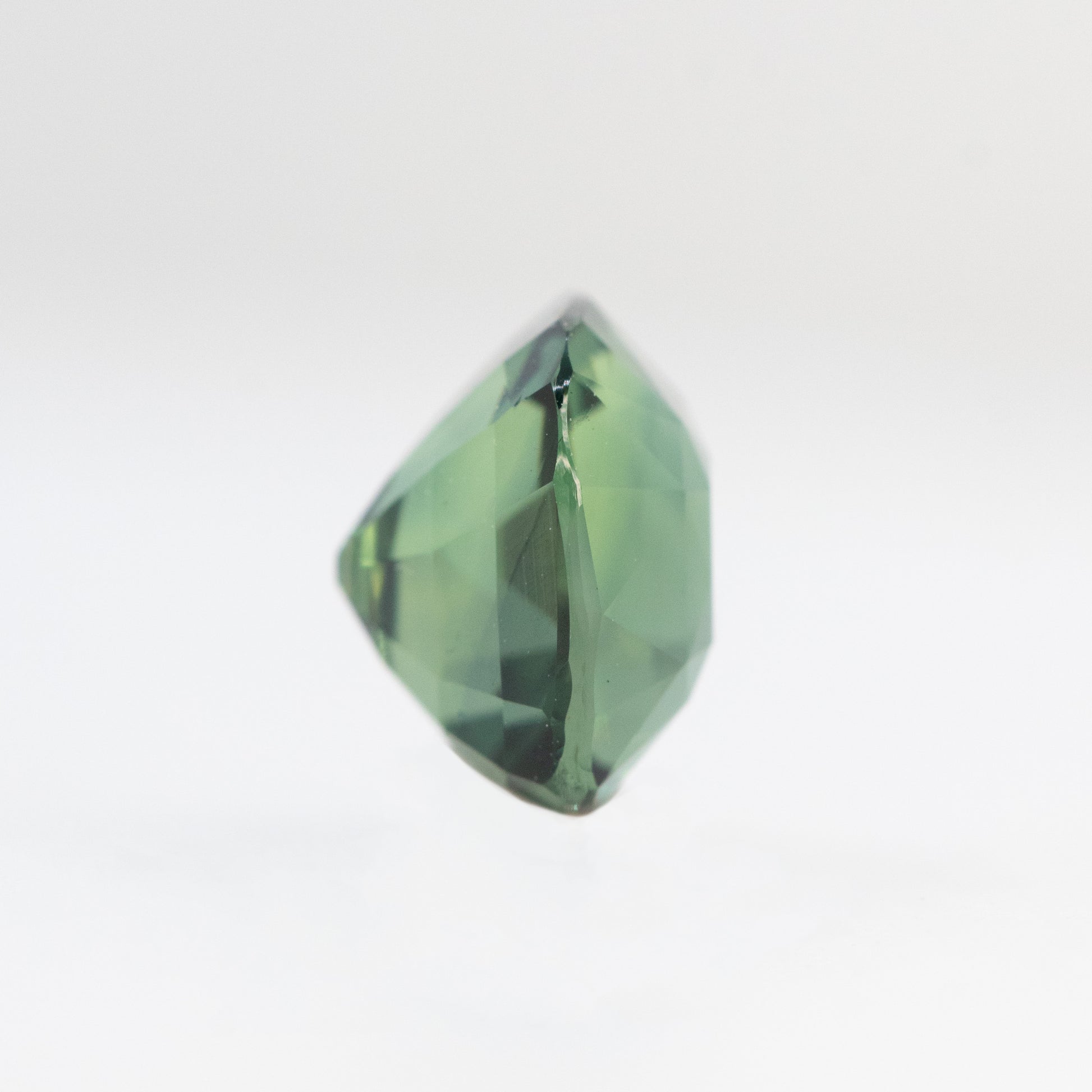 CAELEN (J) 2.04 Carat Green Cushion Cut Sapphire for Custom Work - Inventory Code GCS204 - Midwinter Co. Alternative Bridal Rings and Modern Fine Jewelry