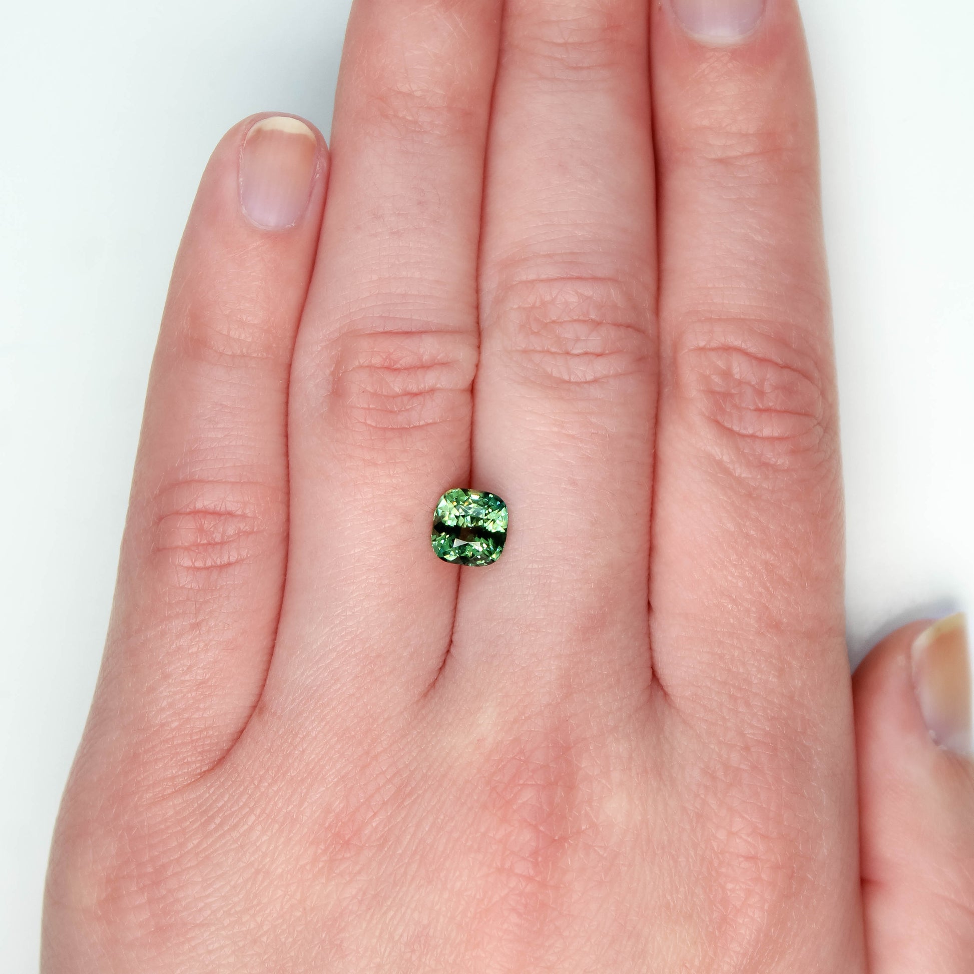 CAELEN (J) 2.04 Carat Green Cushion Cut Sapphire for Custom Work - Inventory Code GCS204 - Midwinter Co. Alternative Bridal Rings and Modern Fine Jewelry