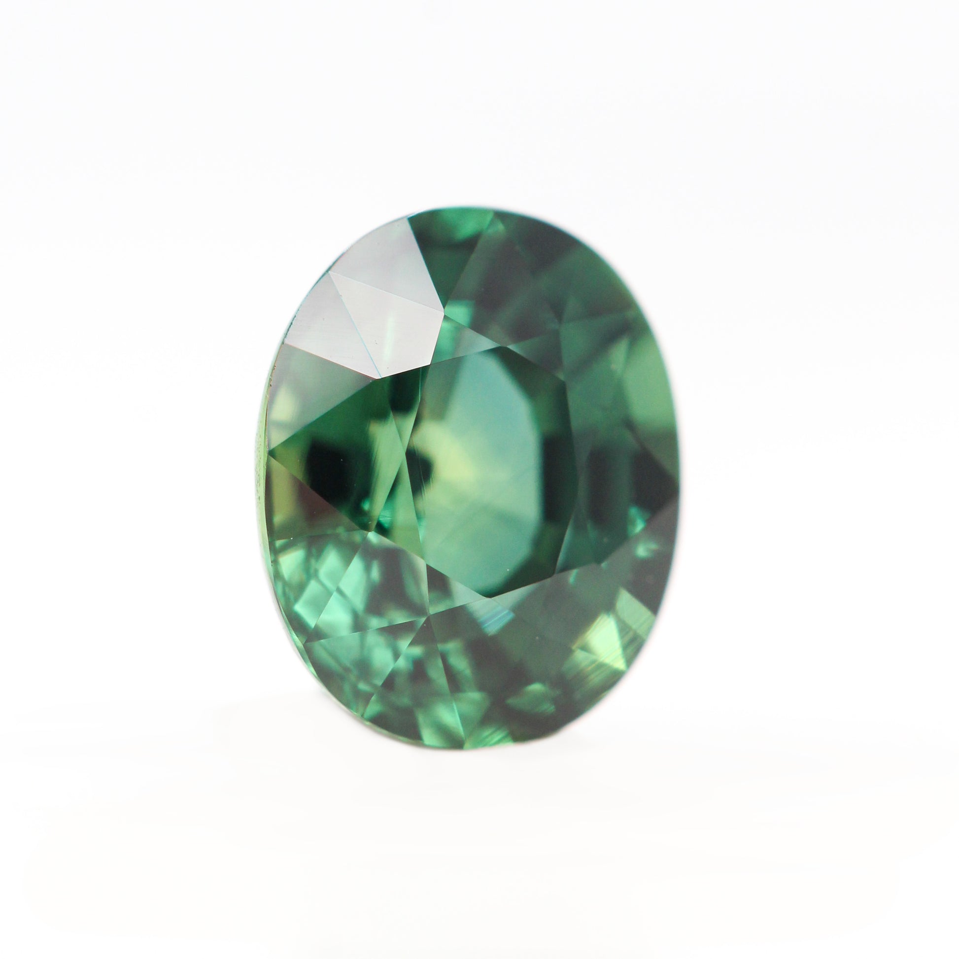 1.27 Carat Green Oval Madagascar Sapphire for Custom Work - Inventory Code GOS127 - Midwinter Co. Alternative Bridal Rings and Modern Fine Jewelry