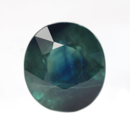 6.70 Carat Dark Teal Oval Sapphire for Custom Work - Inventory Code TOS670 - Midwinter Co. Alternative Bridal Rings and Modern Fine Jewelry