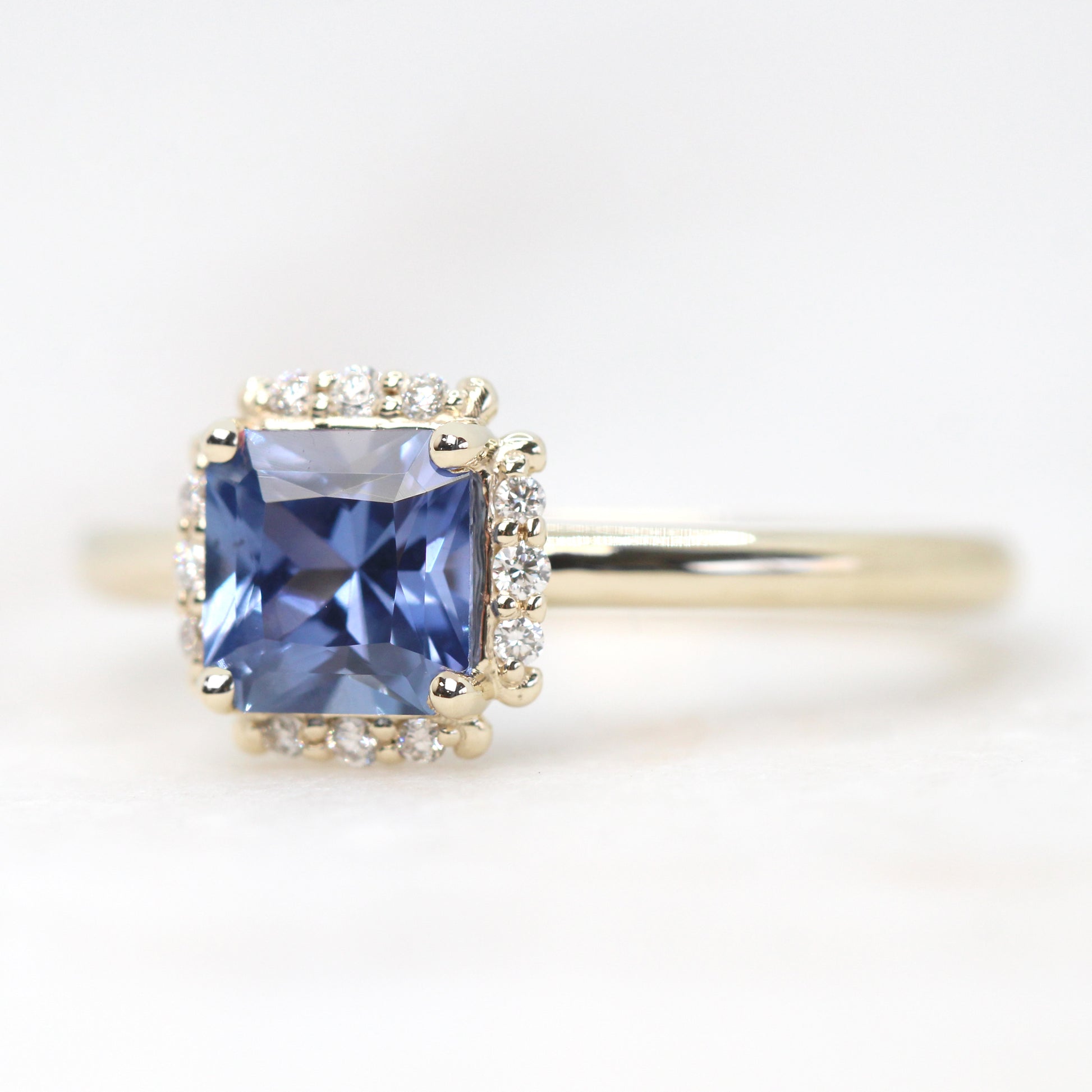 Astrid Ring with a 1.08 Carat Radiant Cut Blue Sapphire and White Accent Diamonds in 10k Yellow Gold - Ready to Size and Ship - Midwinter Co. Alternative Bridal Rings and Modern Fine Jewelry