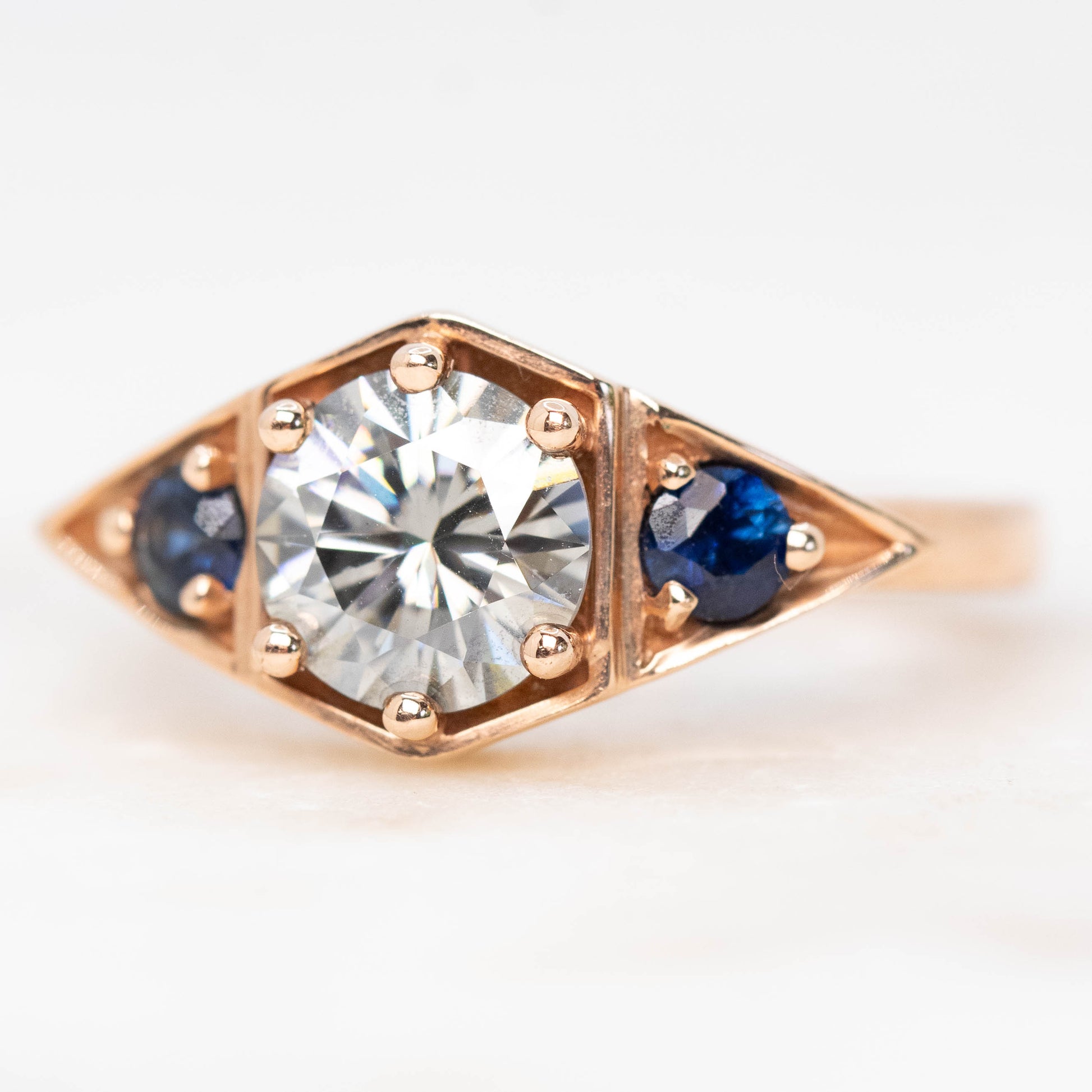 Cassia Ring with a 1.00 Carat Round Gray Moissanite and Blue Sapphire Accents in 10k Rose Gold - Ready to Size and Ship - Midwinter Co. Alternative Bridal Rings and Modern Fine Jewelry