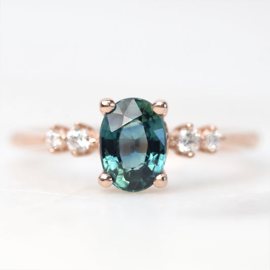Cordelia Ring with a 1.17 Carat Oval Light Teal Blue Sapphire and White Accent Diamonds in 10k Rose Gold - Ready to Size and Ship