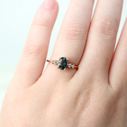 Cordelia Ring with a 1.17 Carat Oval Light Teal Blue Sapphire and White Accent Diamonds in 10k Rose Gold - Ready to Size and Ship - Midwinter Co. Alternative Bridal Rings and Modern Fine Jewelry