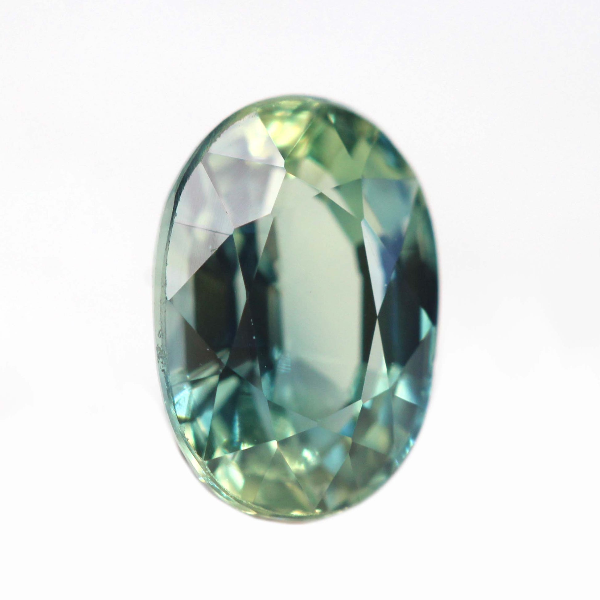 1.42 Carat Bicolor Green Blue Oval Sapphire for Custom Work - Inventory Code BGOSAP142 - Midwinter Co. Alternative Bridal Rings and Modern Fine Jewelry