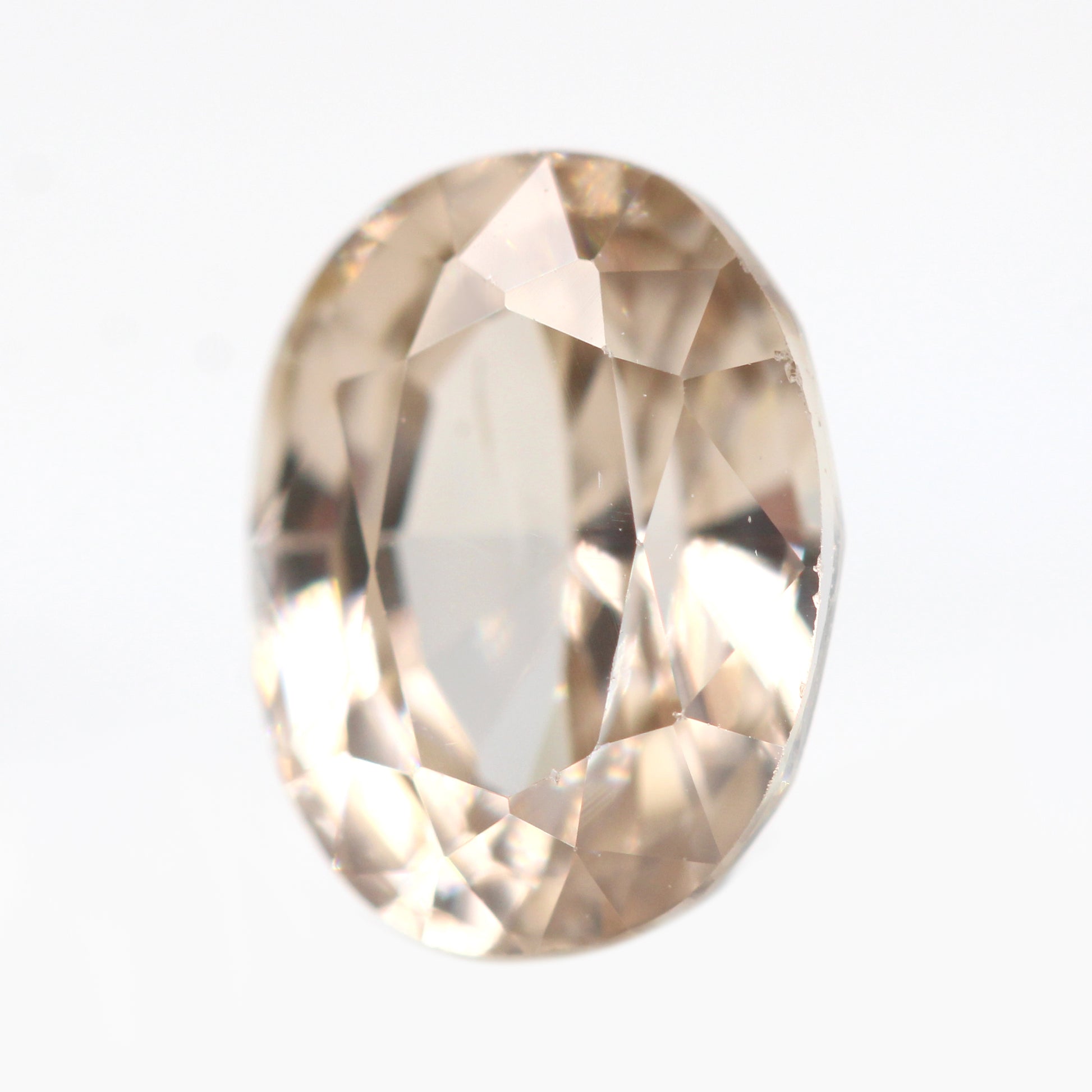 3.05 Carat Golden Light Peach Champagne Oval Sapphire for Custom Work - Inventory Code COS305 - Midwinter Co. Alternative Bridal Rings and Modern Fine Jewelry